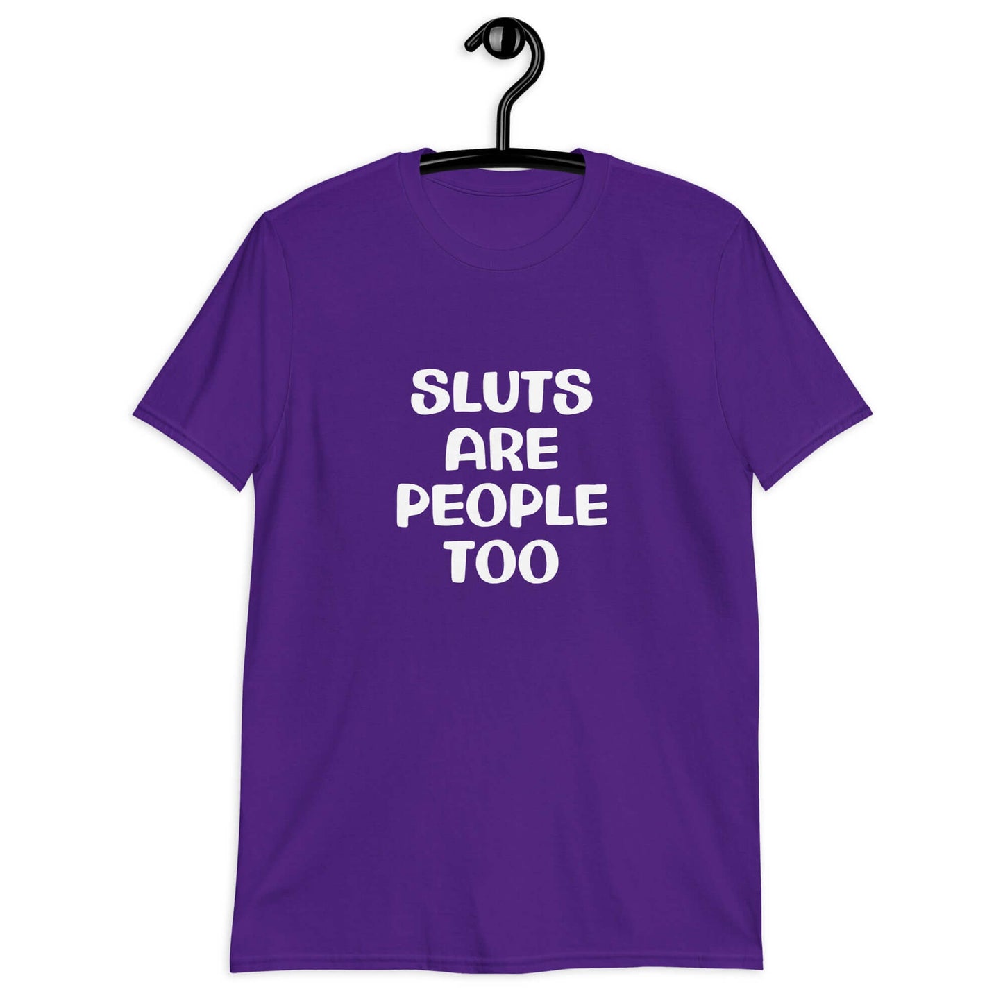 Purple t-shirt with the phrase Sluts are people too printed on the front.