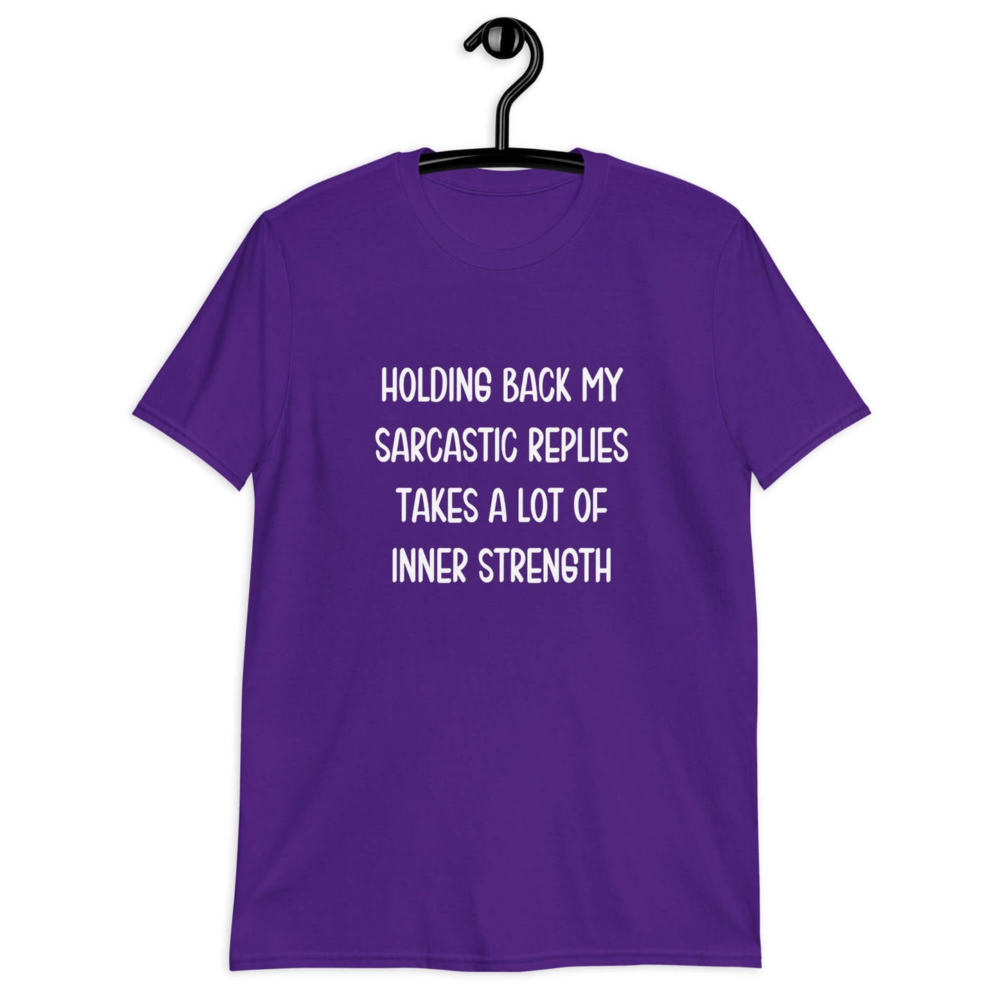 Purple t-shirt with the phrase Holding back my sarcastic replies takes a lot of inner strength printed on the front.