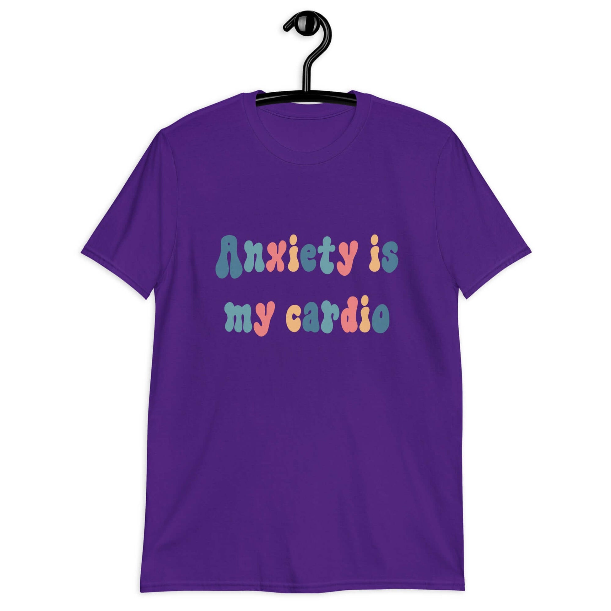 Purple t-shirt with the phrase Anxiety is my cardio printed in multiple colors on the front of the shirt.