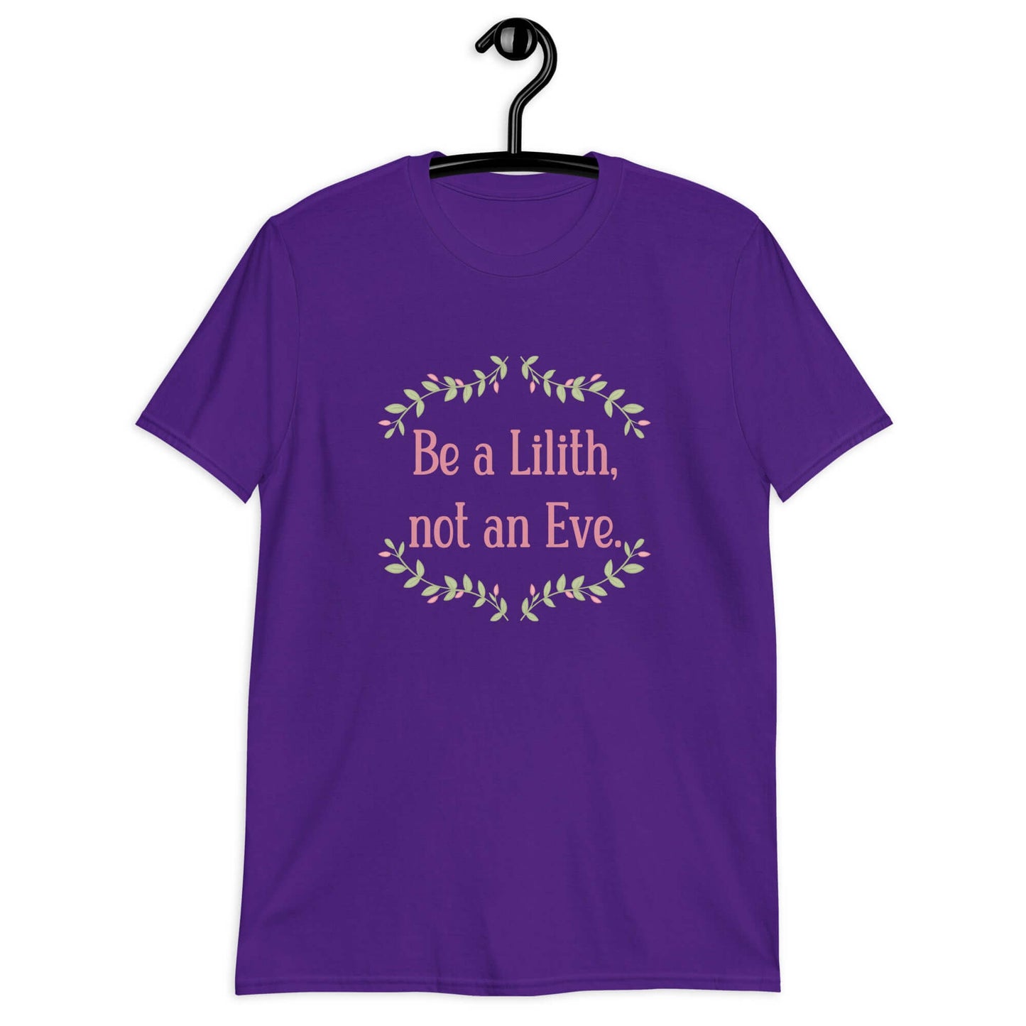 Purple t-shirt with the phrase Be a Lilith, not an Eve printed on the front. The text is pink and had a green floral vine graphic framing the text. 