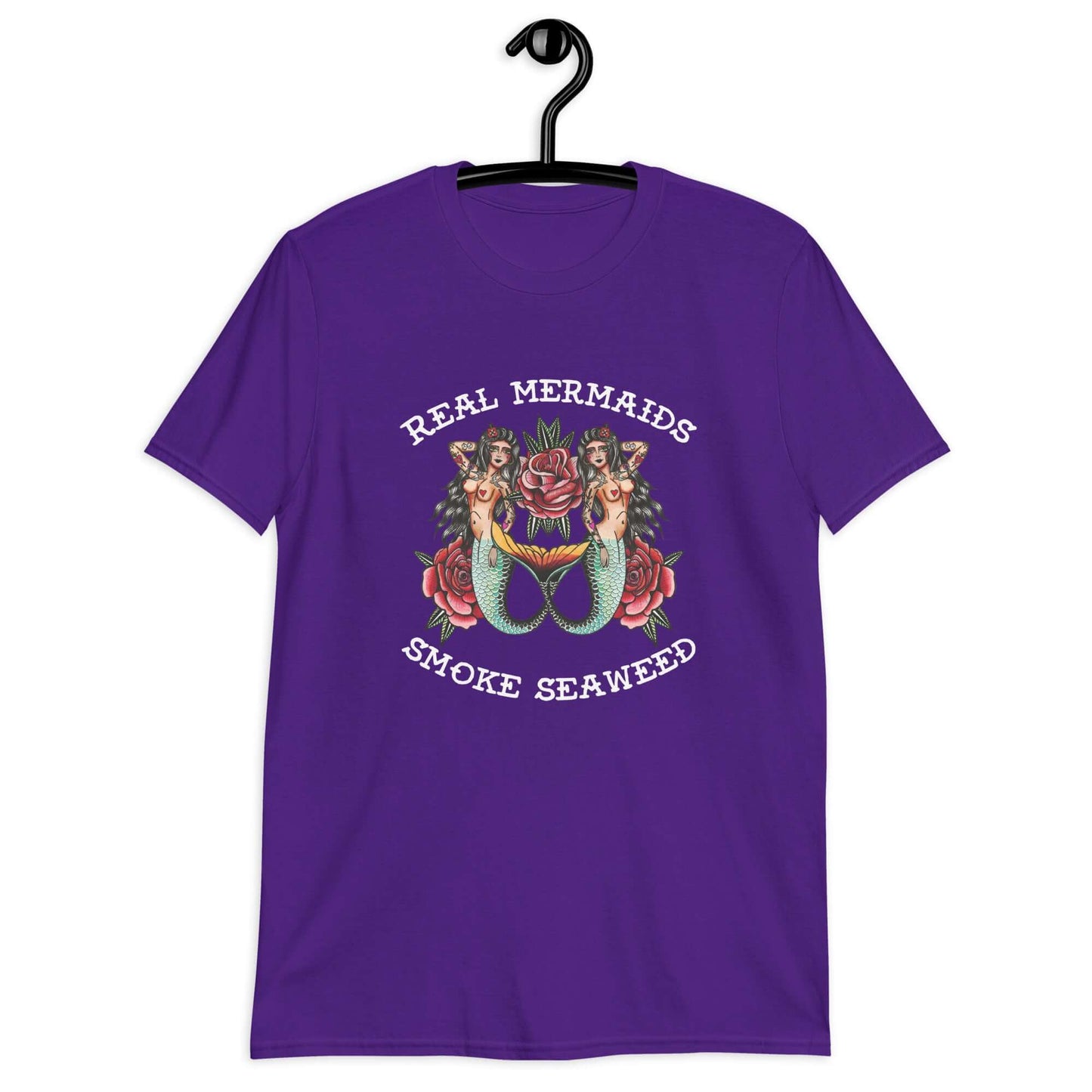 Purple t-shirt with image of 2 mermaids and the words Real mermaids smoke seaweed printed on the front.