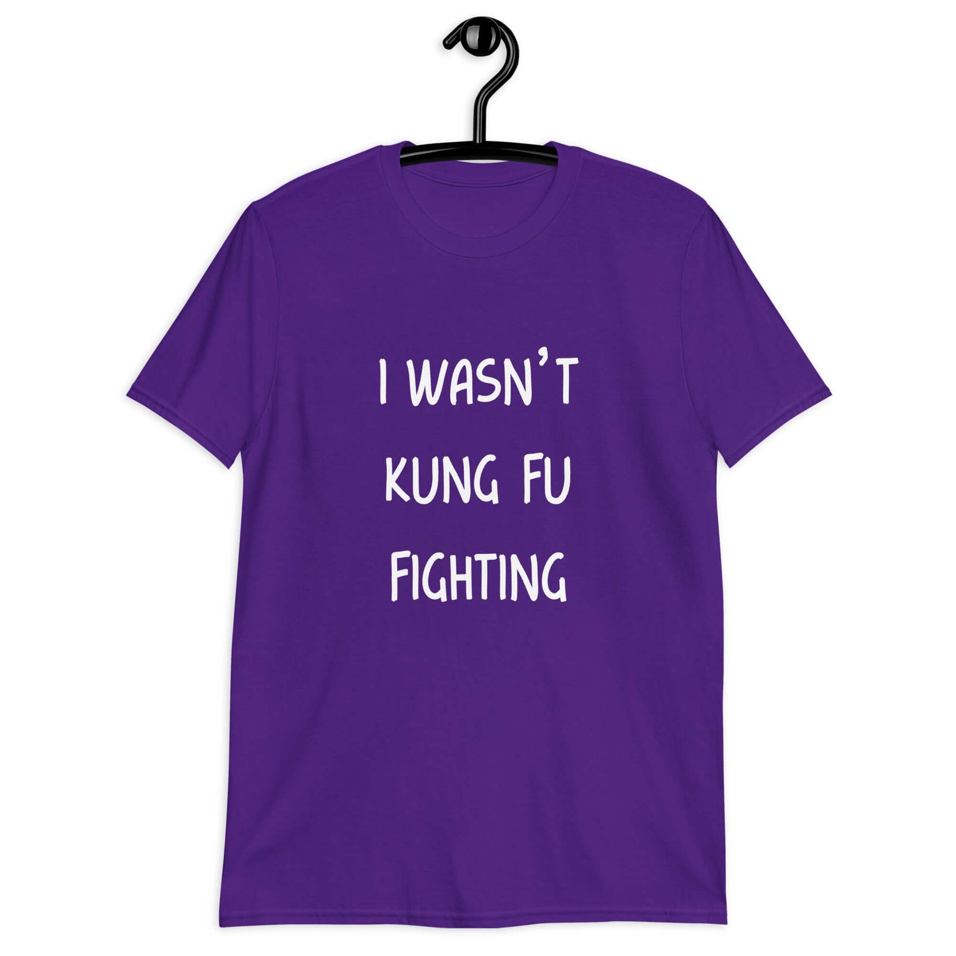 Purple t-shirt with the funny phrase I wasn't kung fu fighting printed on the front.