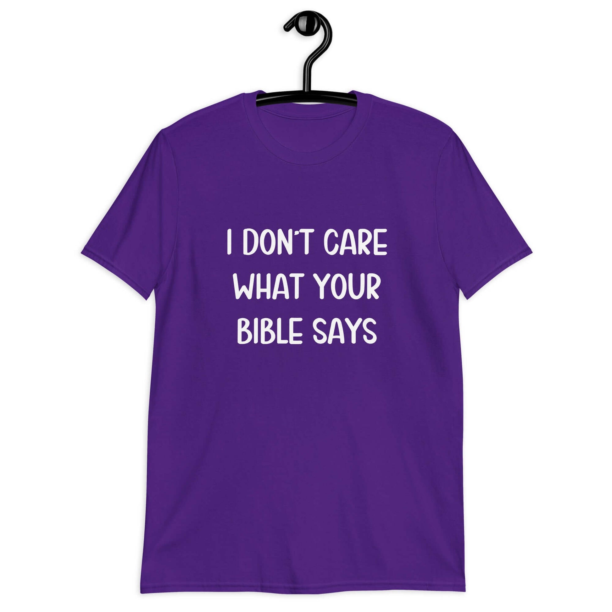 Purple t-shirt with the phrase I don't care what your bible says printed on the front.