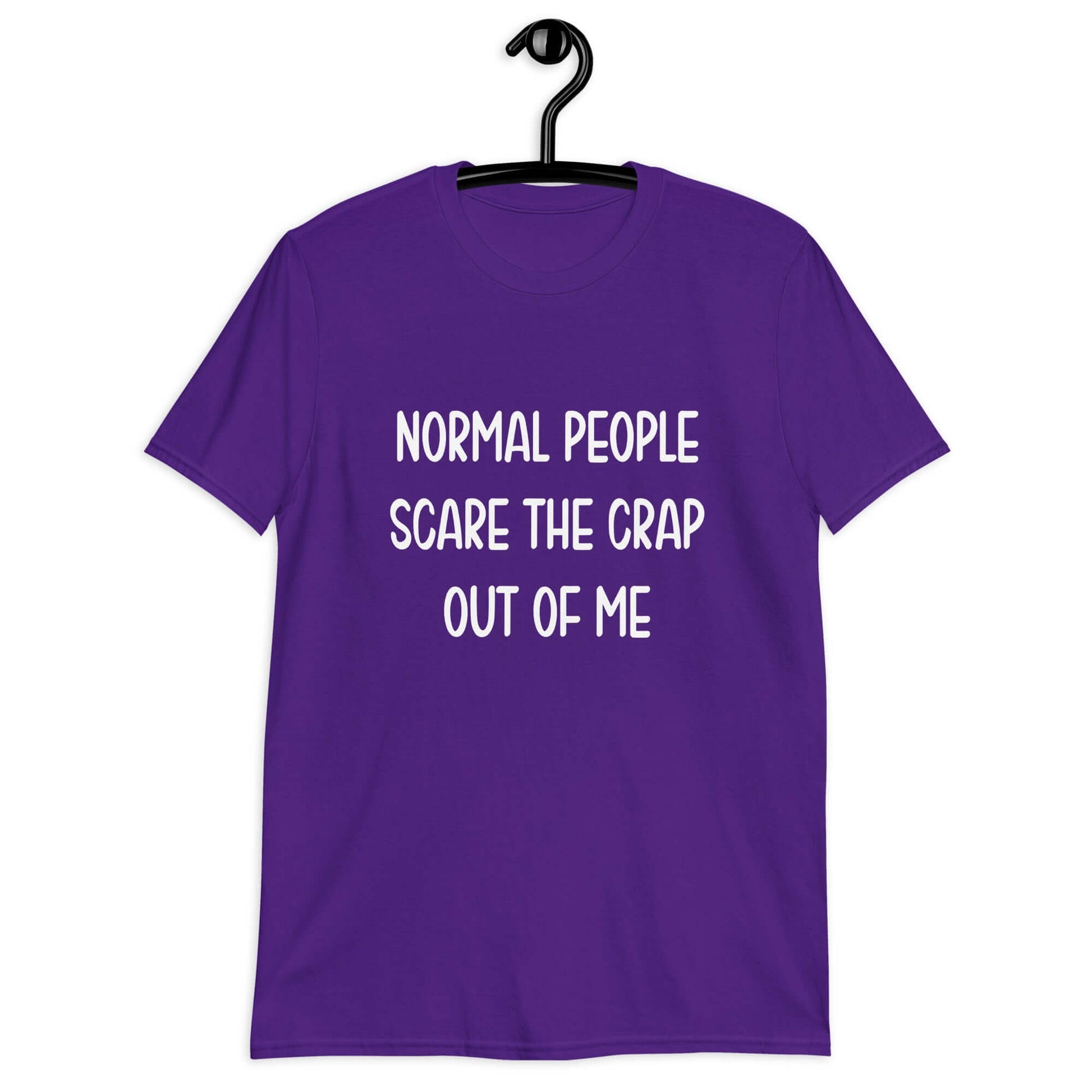 Purple t-shirt with the phrase Normal people scare the crap out of me printed on the front.