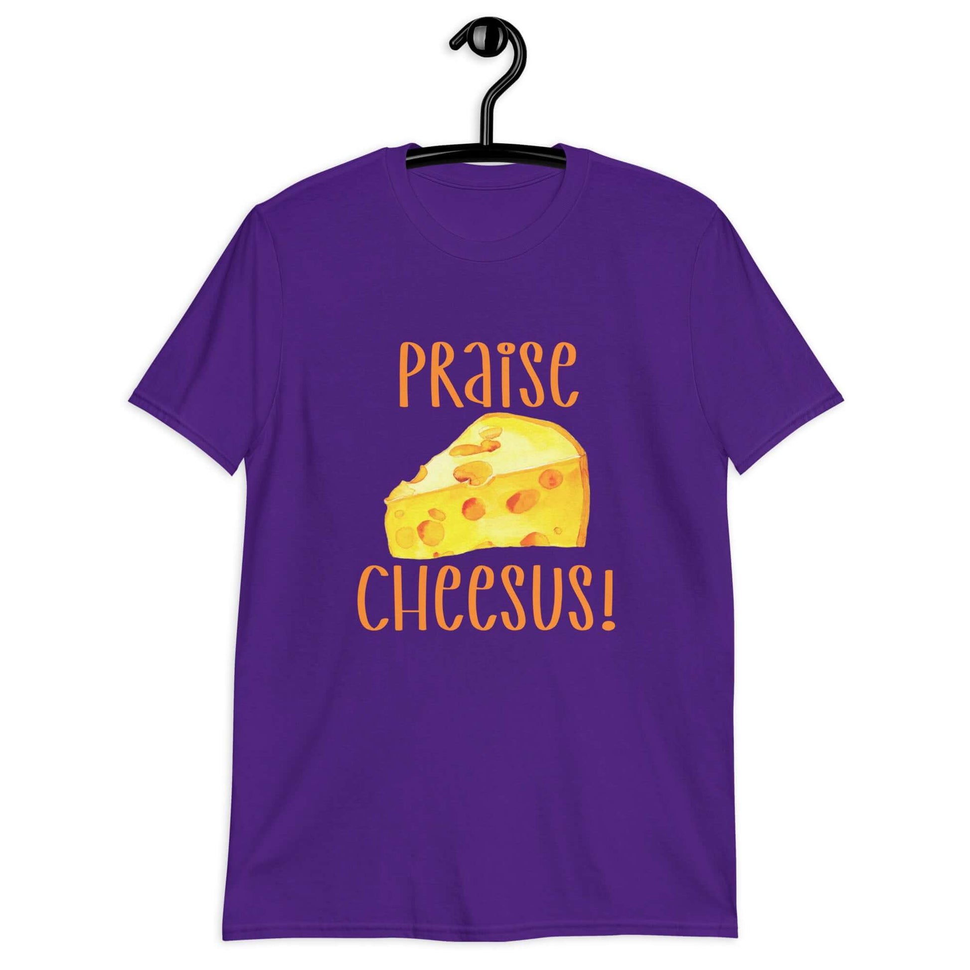 Purple t-shirt with funny graphics of a piece of swiss cheese and the words Praise Cheesus printed on the front of the hoodie in yellow and orange.