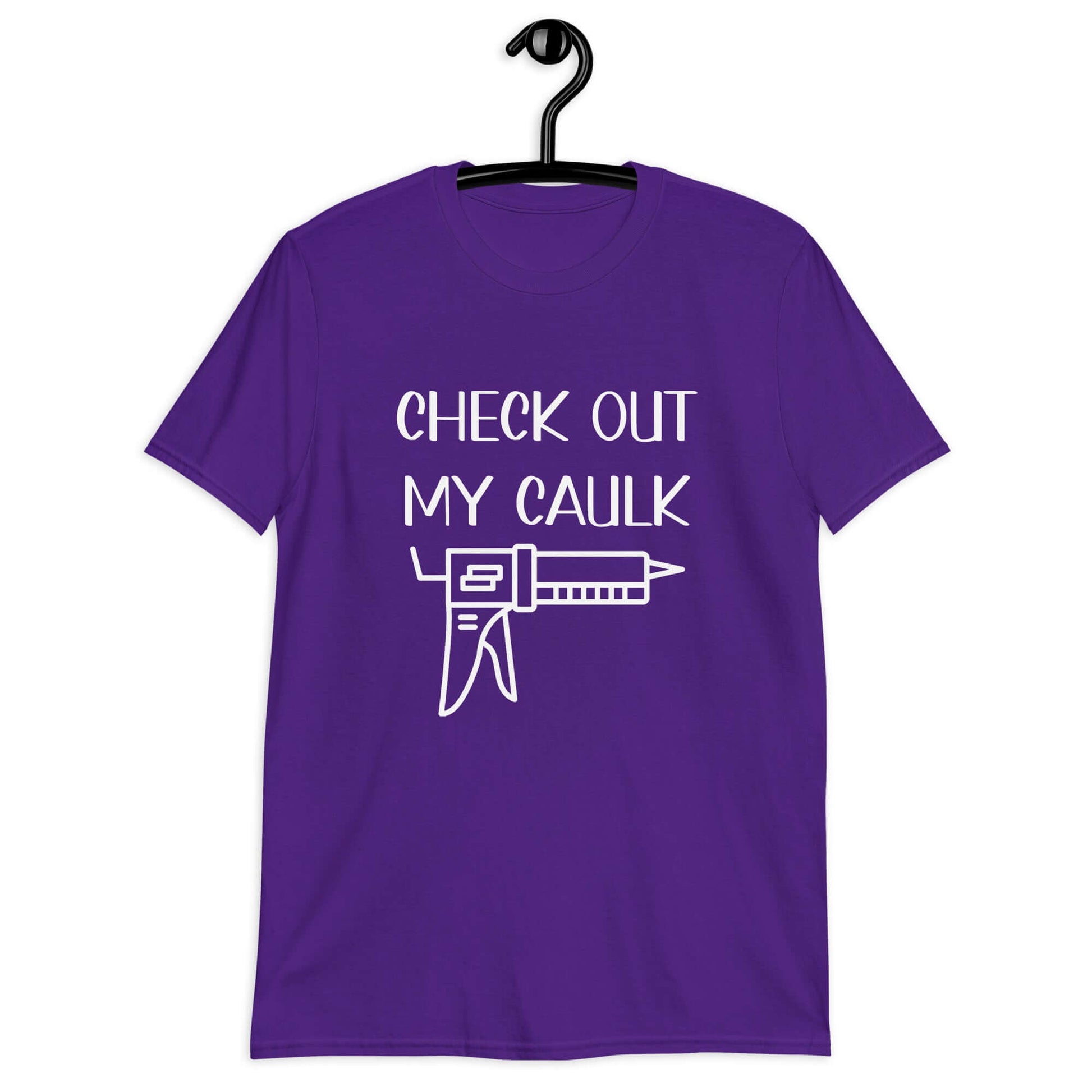 Purple t-shirt with the pun phrase Check out my caulk with a line drawing image of a caulking gun printed on the front.