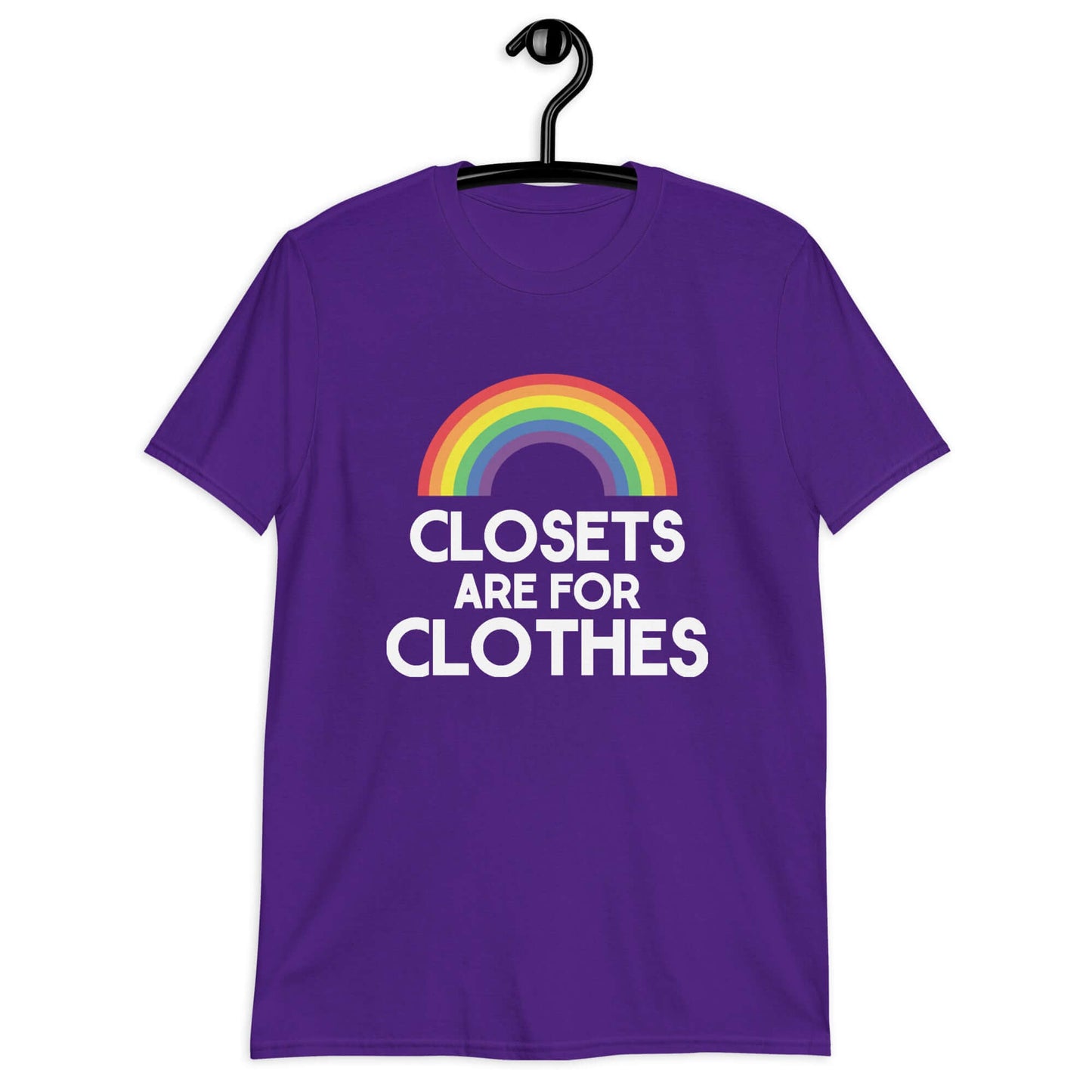 Purple t-shirt with a rainbow and the words Clothes are for closets printed on the front.