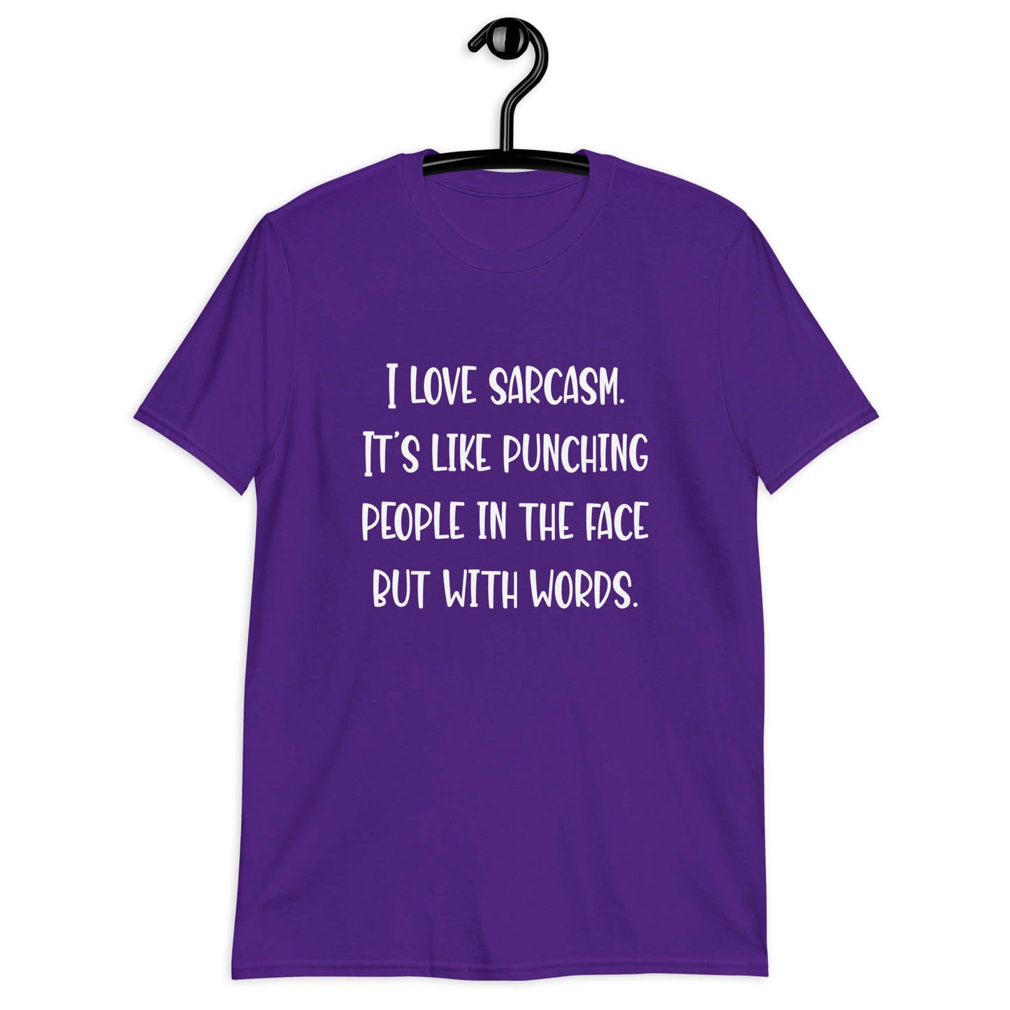 Purple t-shirt with the phrase I love sarcasm, it's like punching people in the face but with words printed on the front.