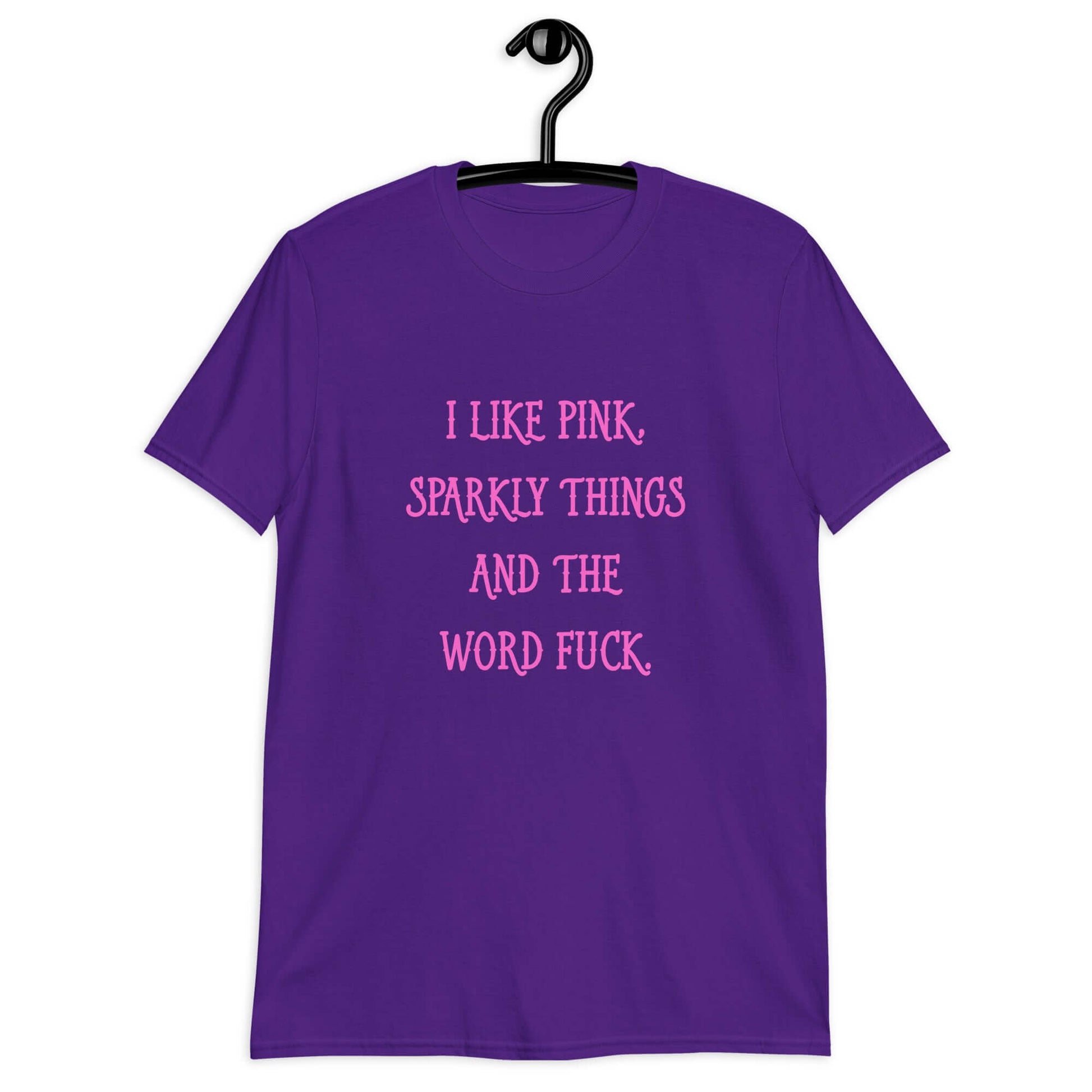 Purple t-shirt with the phrase I like pink, sparkly things and the word fuck printed in pink on the front of the shirt.