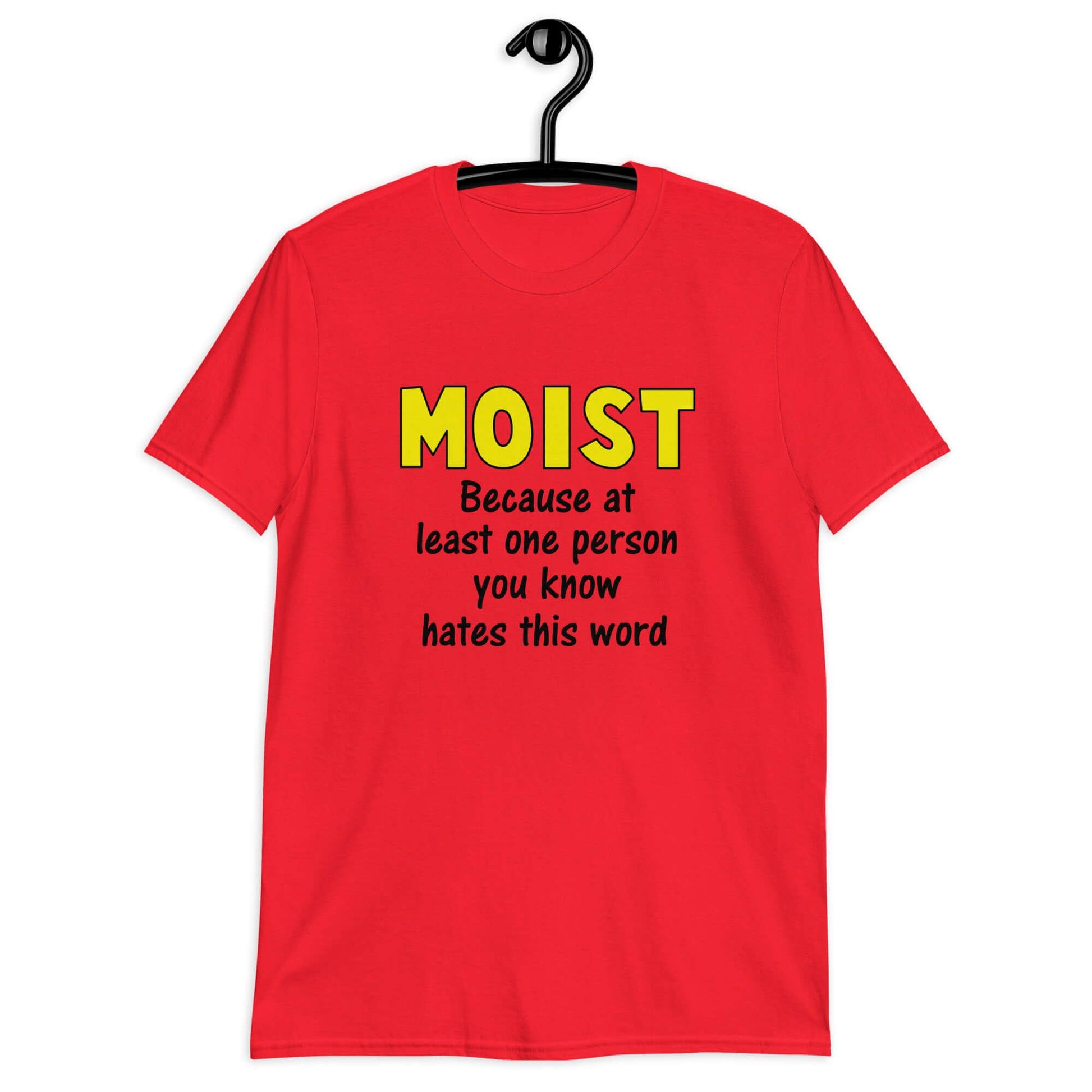 Red t-shirt with the word Moist printed in large yellow bold font. In smaller font under the word moist is the phrase Because at least one person you know hates this word.