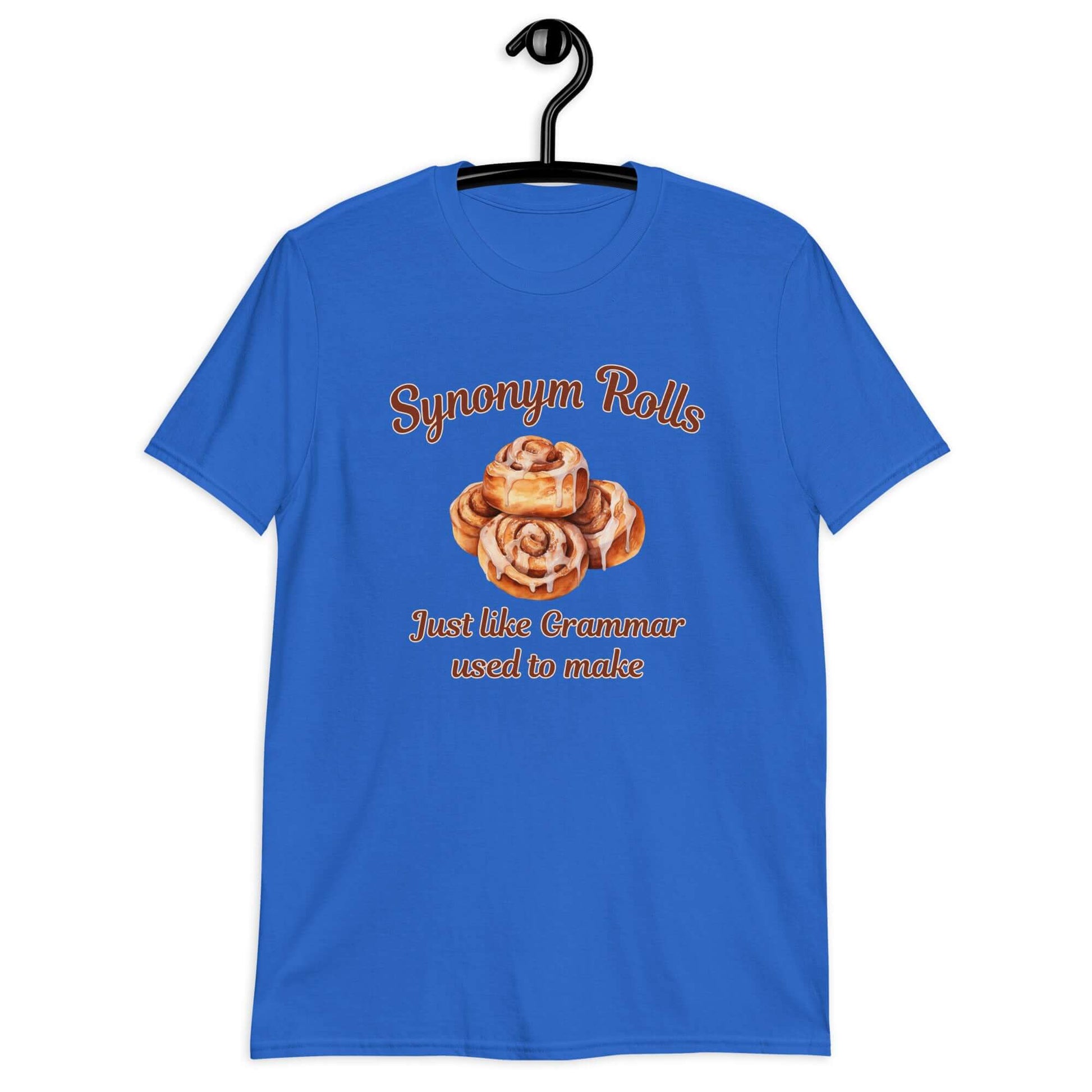 Royal blue t-shirt with an image of cinnamon rolls and the pun phrase Synonym rolls Just like Grammar used to make printed on the front.