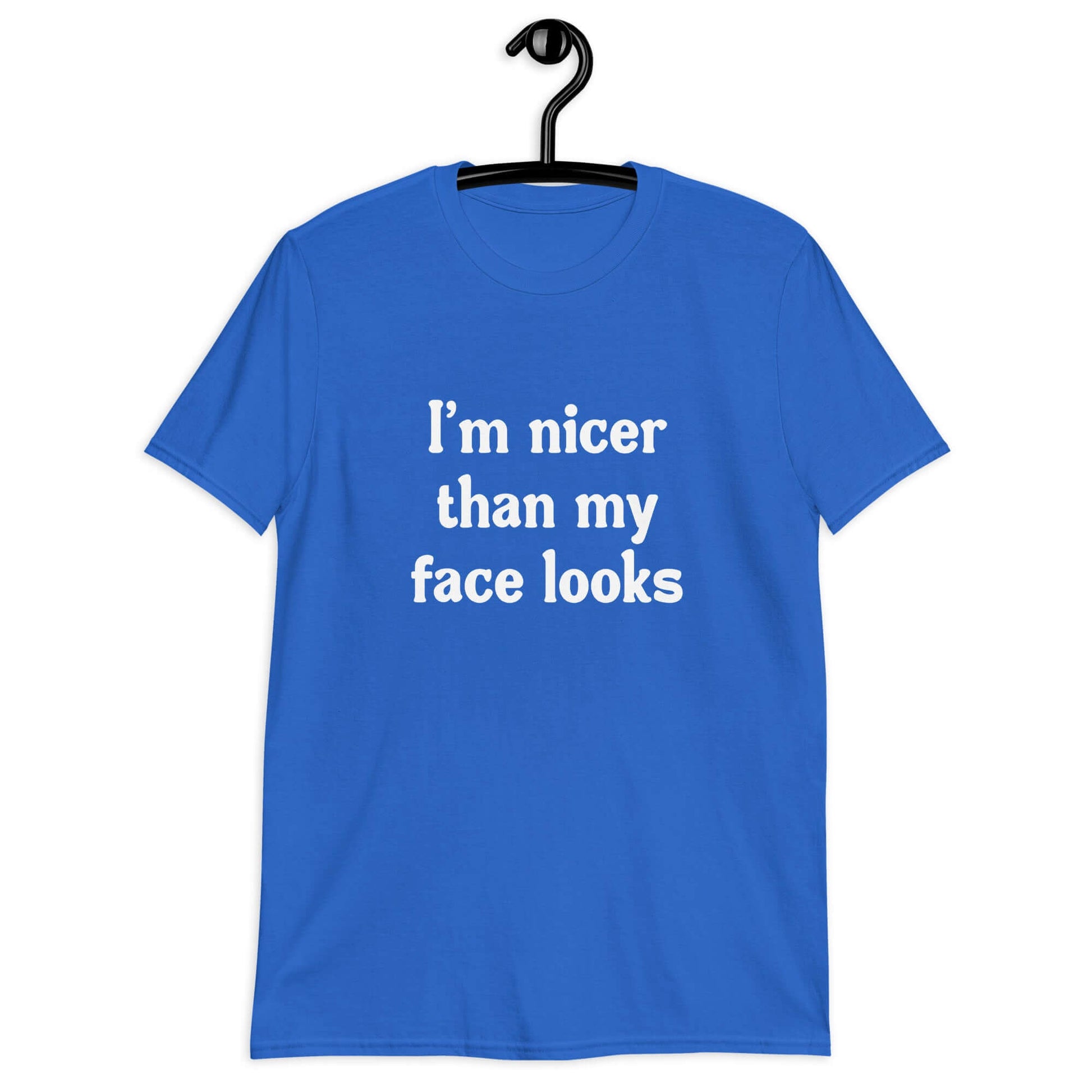 Royal blue t-shirt with the phrase I'm nicer than my face looks printed on the front.