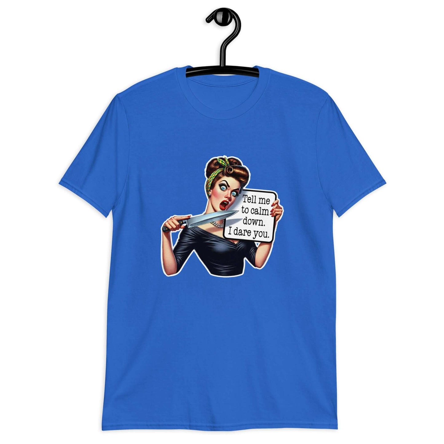 Royal blue t-shirt displayed on a hanger. The t-shirt has a graphic of an angry looking retro woman holding a knife and a sign. The sign says Tell me to calm down I dare you. The graphic is printed on the front of the shirt.