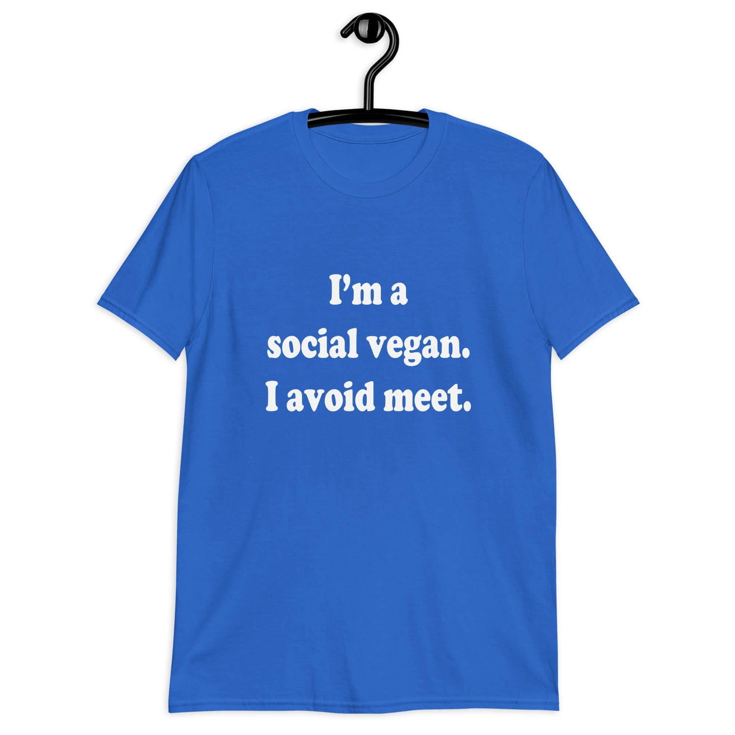 Royal blue t-shirt with the pun phrase I'm a social vegan, I avoid meet printed on the front.