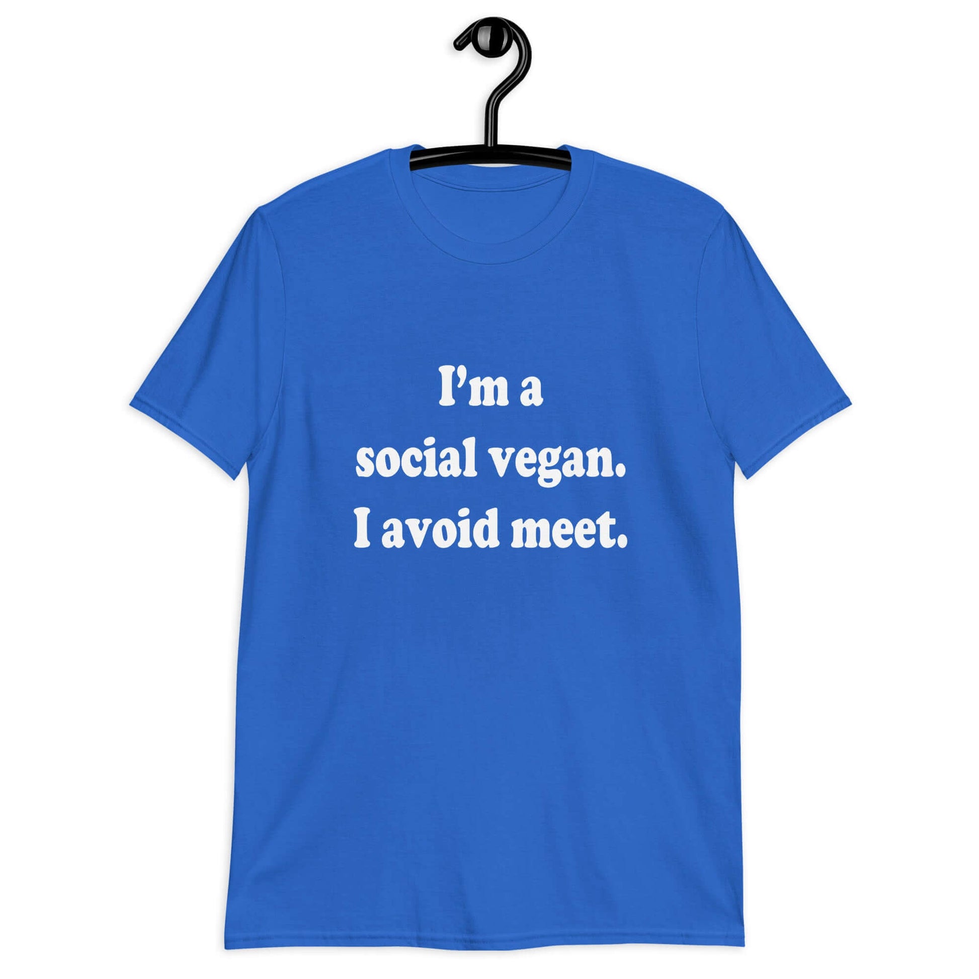 Royal blue t-shirt with the pun phrase I'm a social vegan, I avoid meet printed on the front.