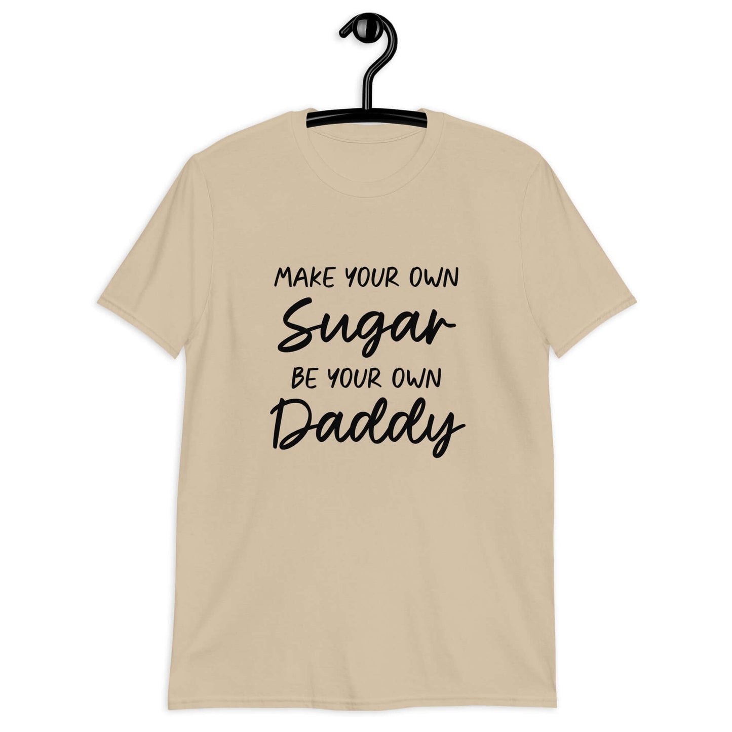 Sand color t-shirt with the phrase Make your own sugar Be your own Daddy printed on the front.