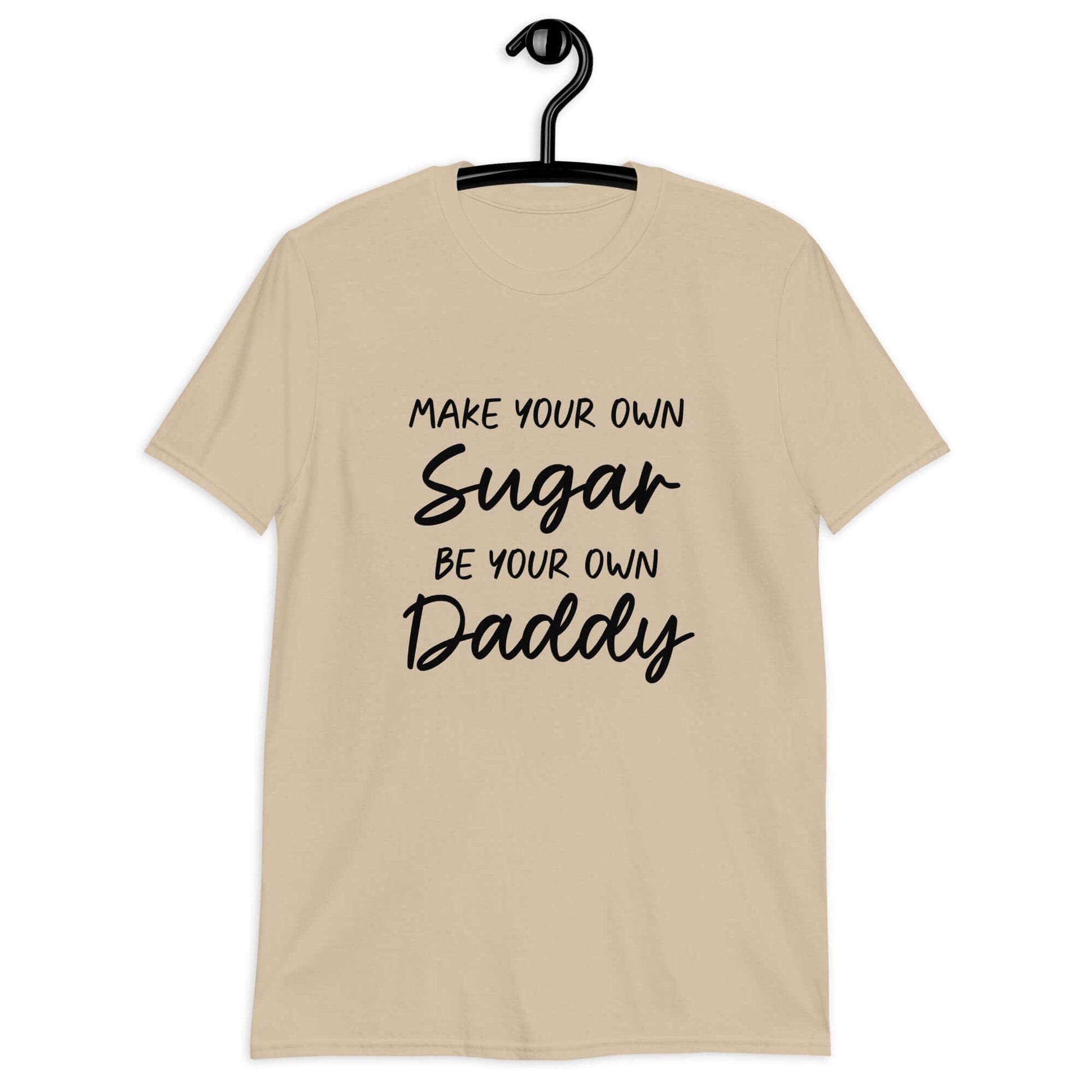 Sand color t-shirt with the phrase Make your own sugar Be your own Daddy printed on the front.