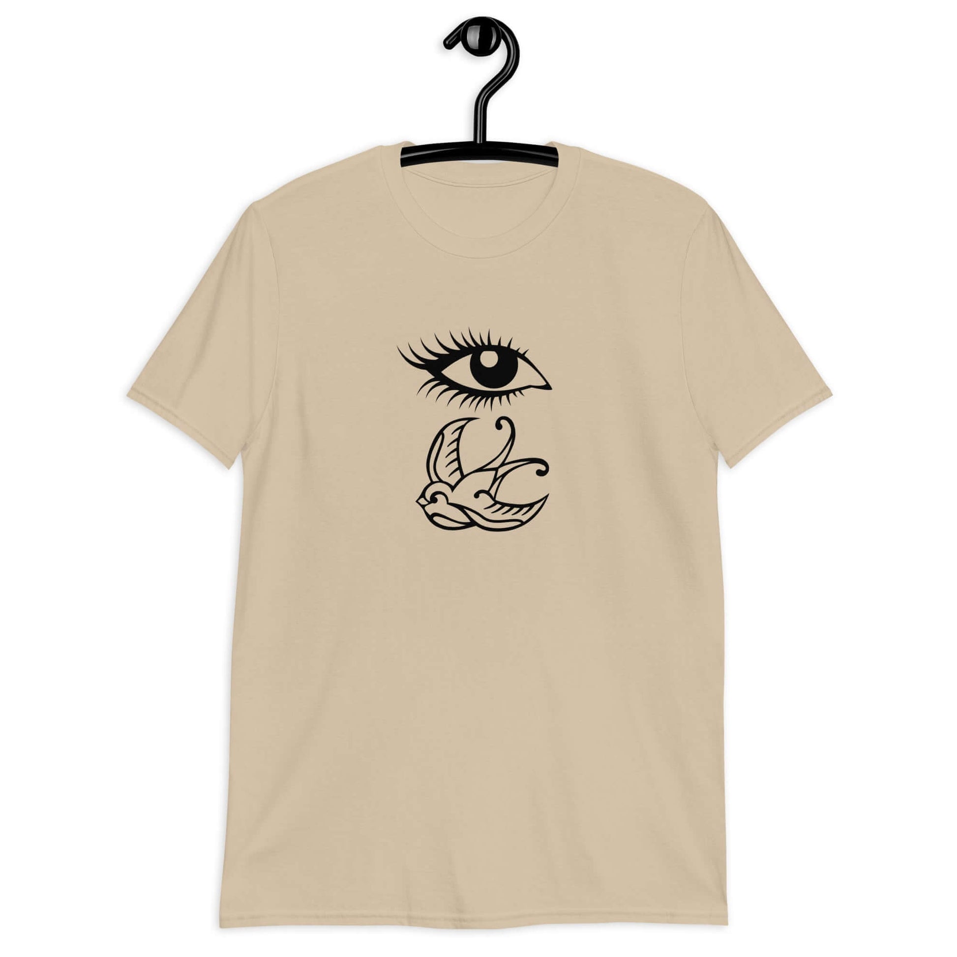 Sand t-shirt with outline drawing of an eye and a swallow bird printed on the front.