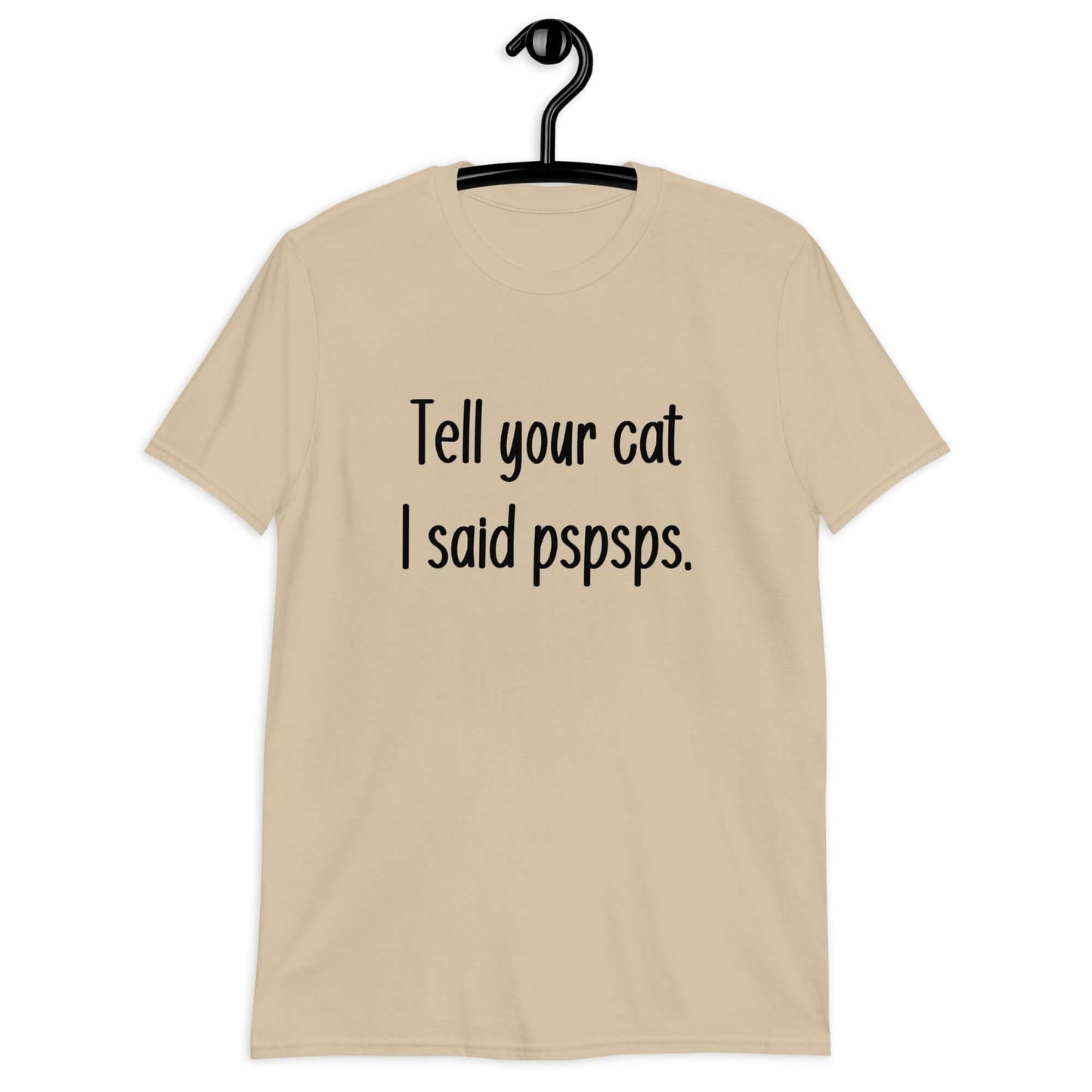 Sand t-shirt with the words Tell your cat I said pspsps printed on the front.