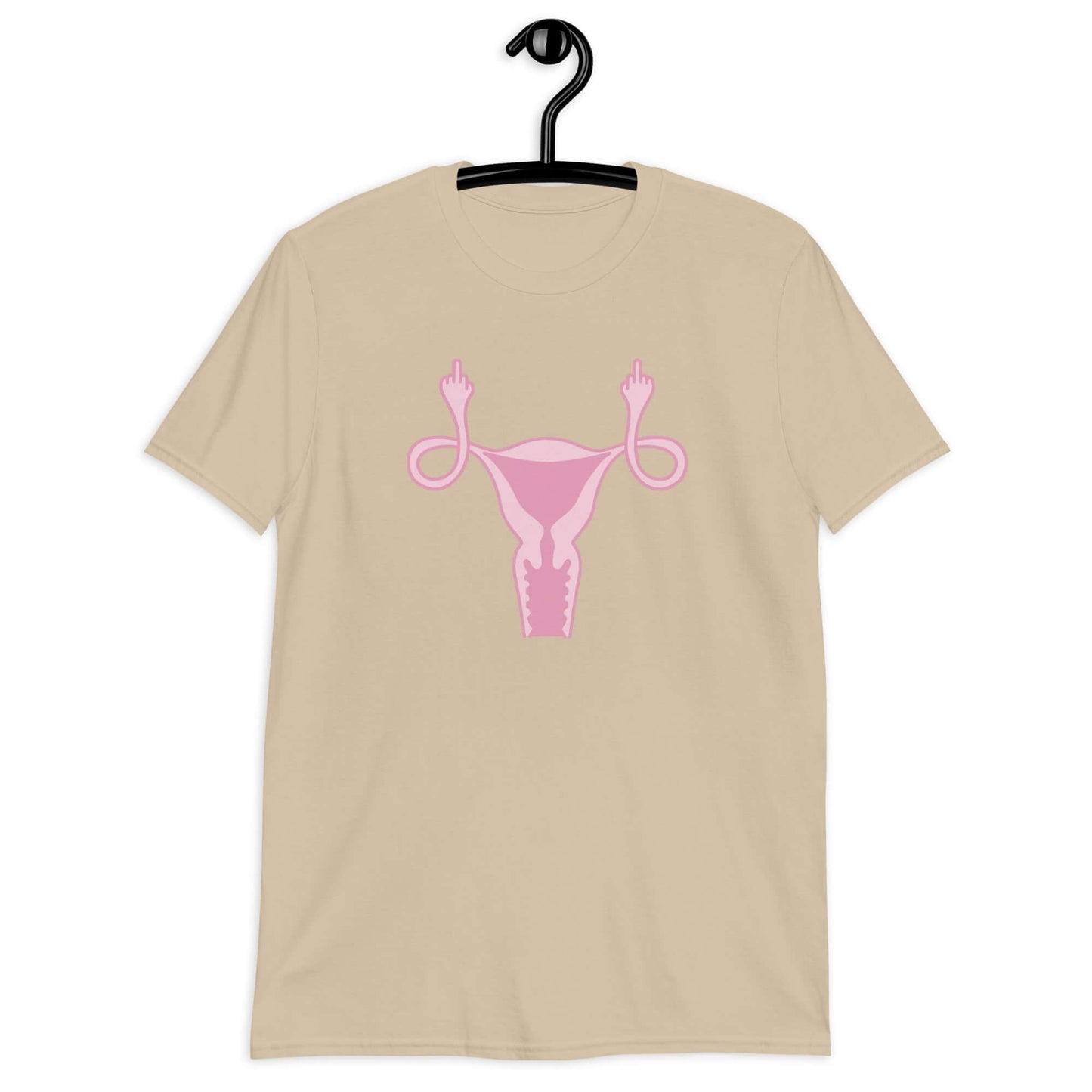 Sand color t-shirt with image of a pink uterus flipping middle finger graphic printed on the front.