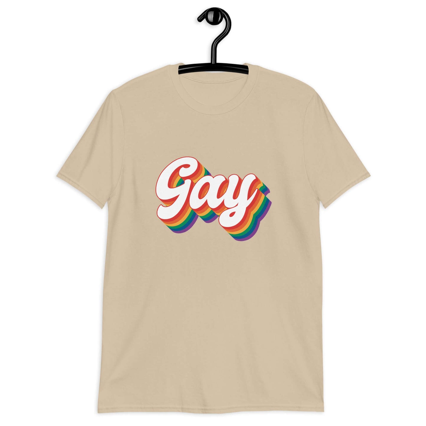 Sand color t-shirt with the word Gay printed on the front. The word gay is outlined in rainbow.