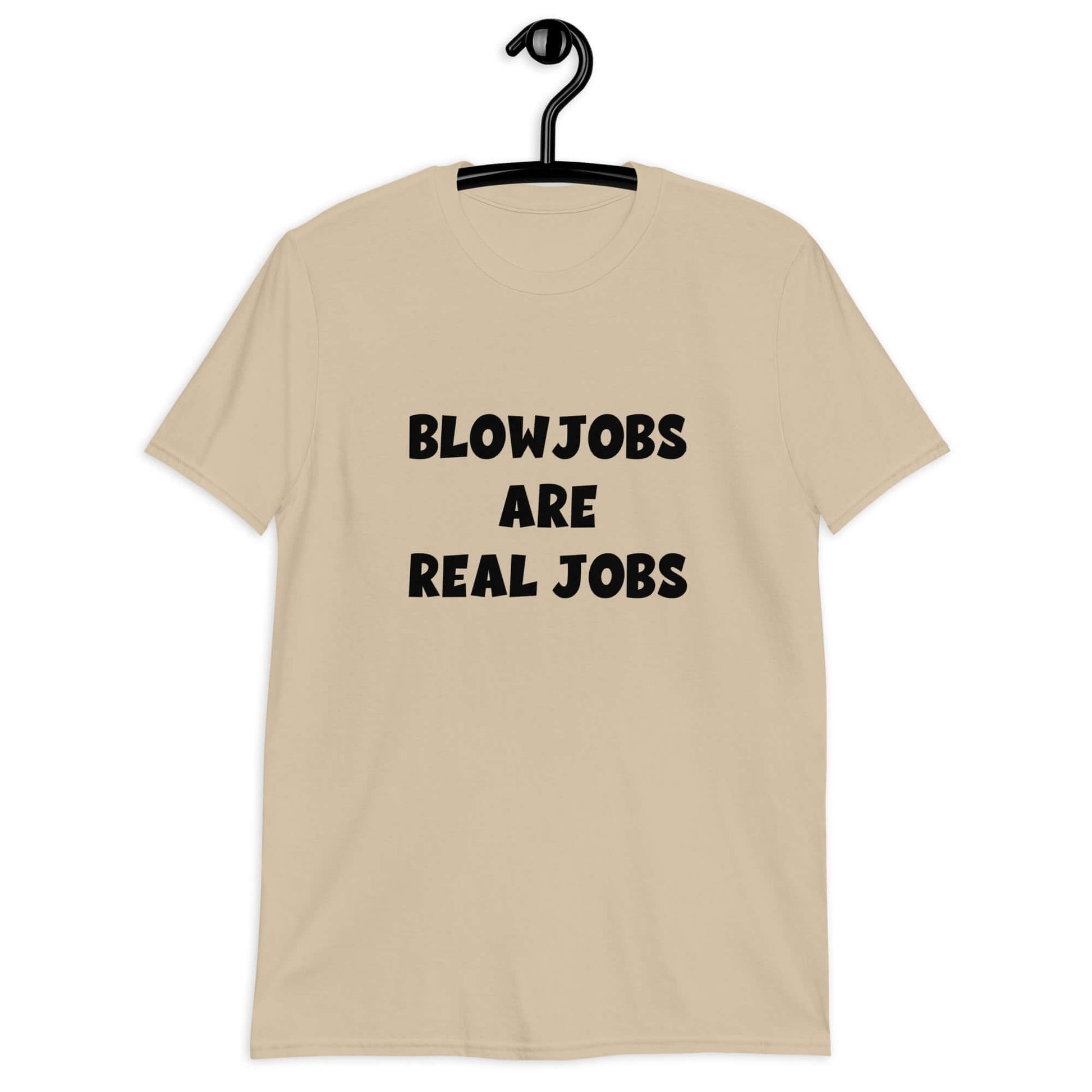 Sand t-shirt with the phrase Blowjobs are real jobs printed on the front.