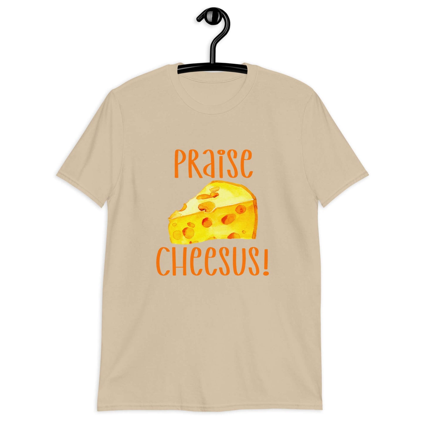 Sand t-shirt with funny graphics of a piece of swiss cheese and the words Praise Cheesus printed on the front of the hoodie in yellow and orange.