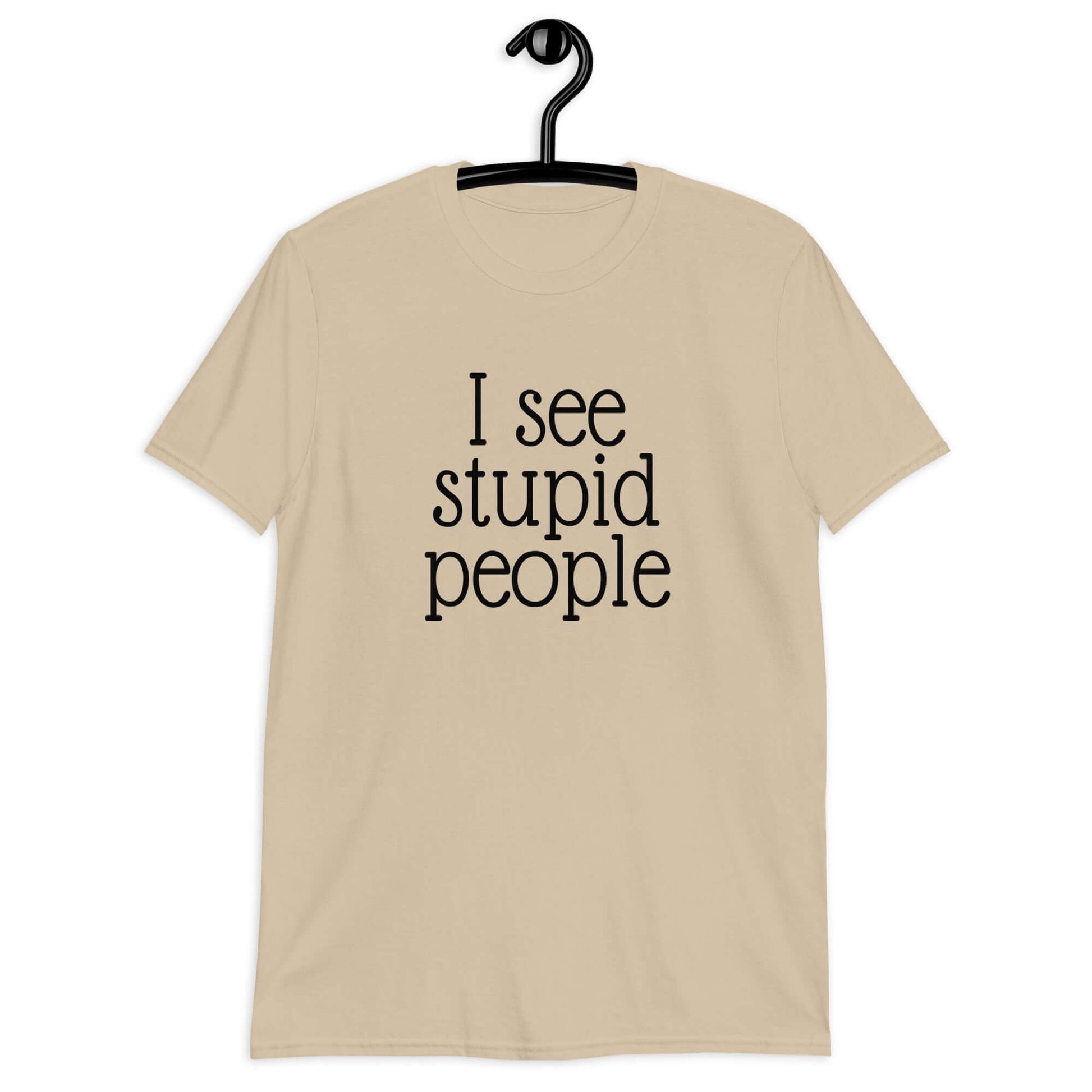 Sand t-shirt that has the phrase I see stupid people printed on the front.