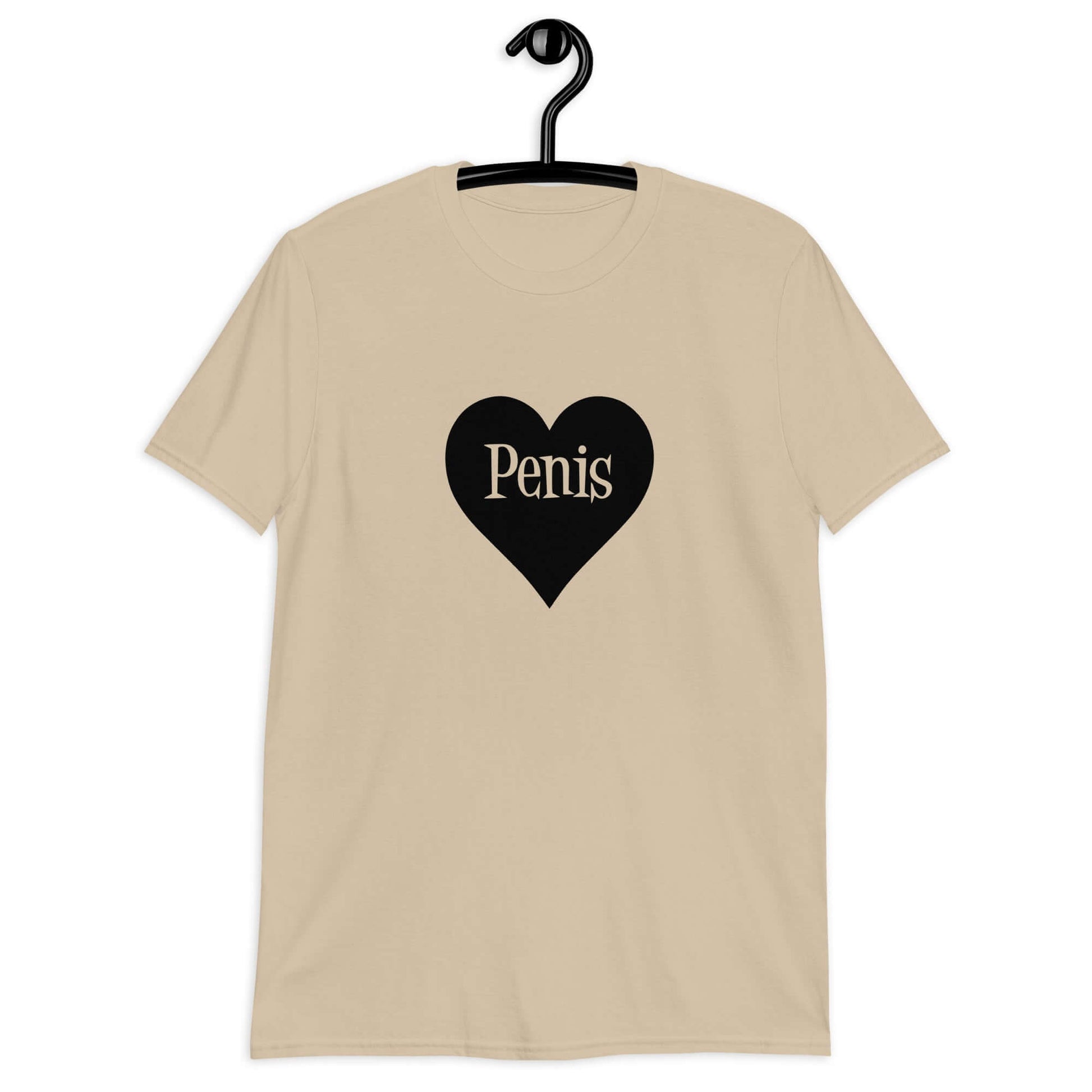 Sand color t-shirt with a heart image printed on the front. The word penis is inside the heart