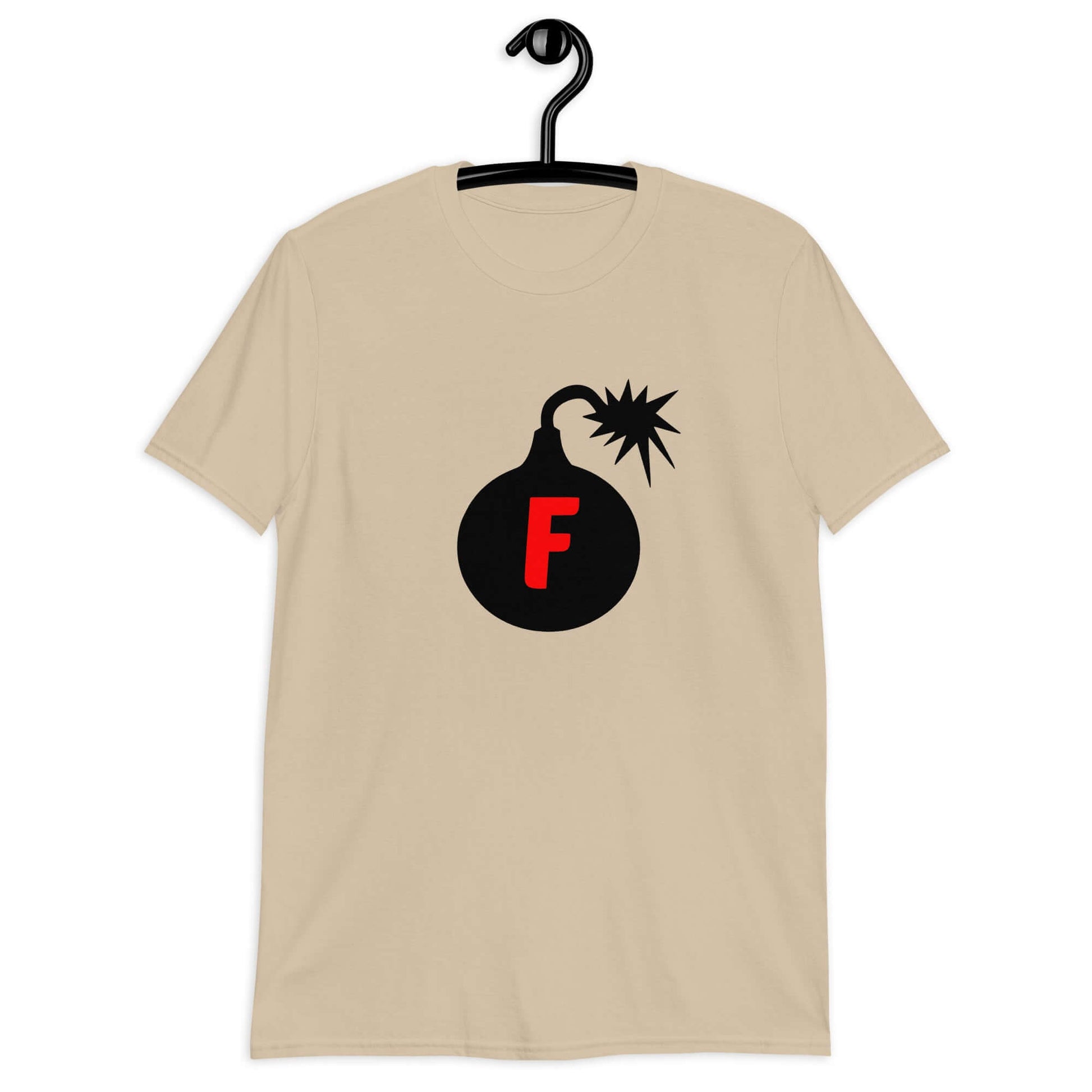 Sand t-shirt with an image of a bomb with the letter F printed in the center. The graphics are printed on the front of the shirt.