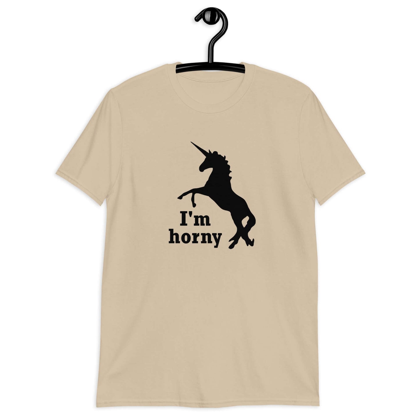 Sand t-shirt with an image of the silhouette of a unicorn and the words I'm horny printed on the front.