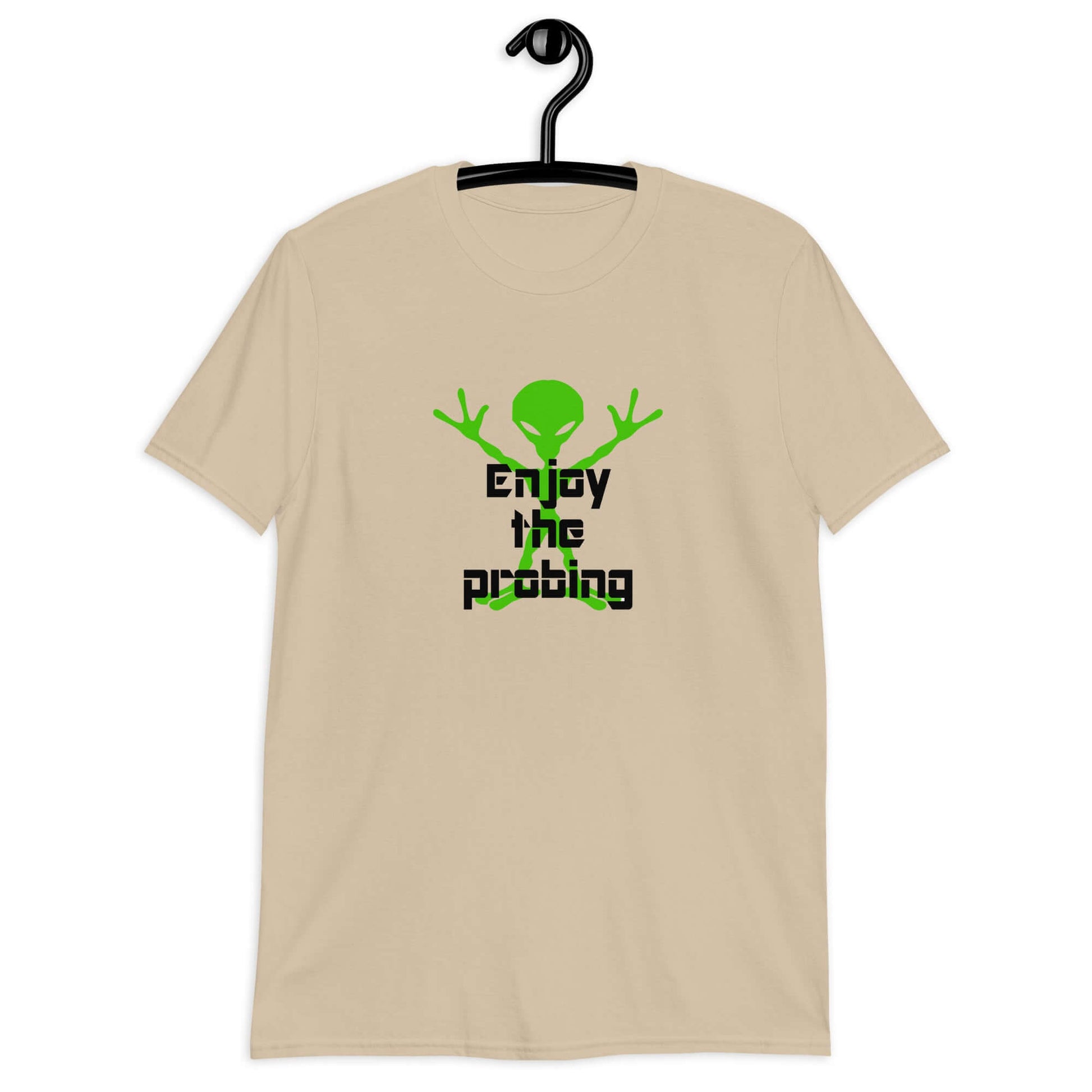 Sand color t-shirt with an image of an alien and the funny phrase Enjoy the probing printed on the front.