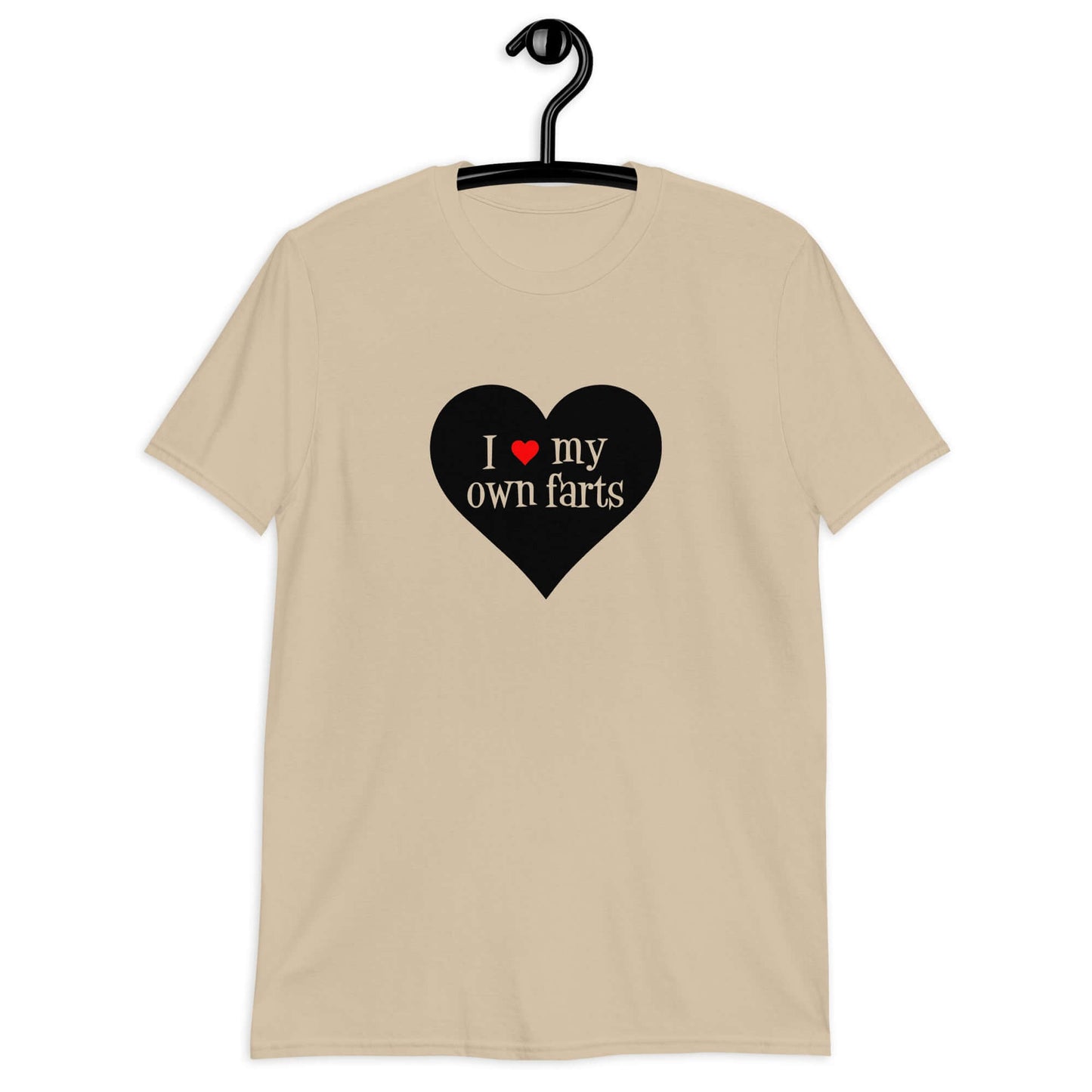 Sand color t-shirt with I heart my own farts printed on the front. The words are printed inside of a larger heart image.