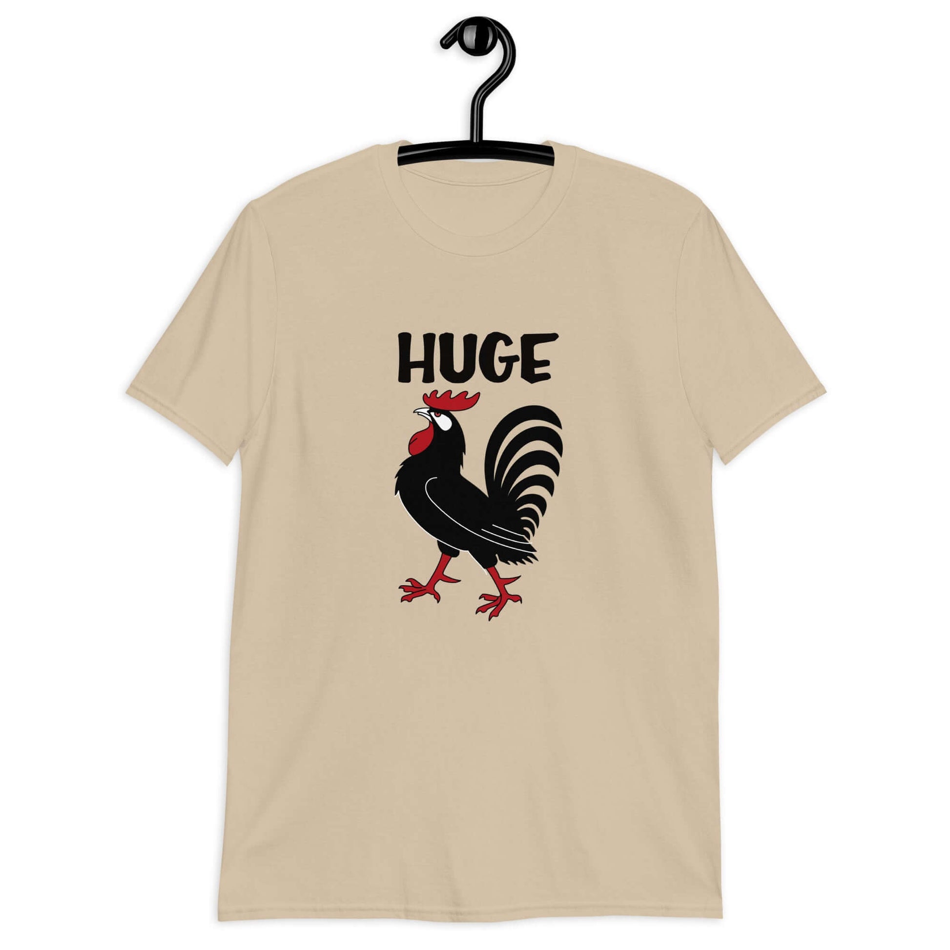 Sand color t-shirt with an image of a rooster and the word Huge above the rooster printed on the front.