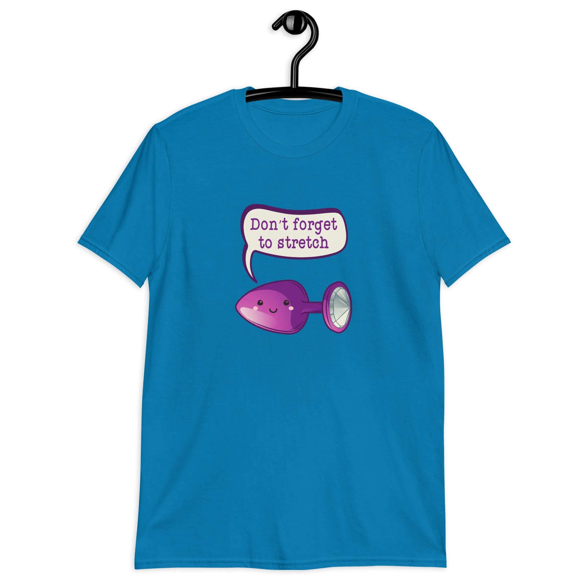 Sapphire blue t-shirt that has image of a purple anal plug with a smile face with a speech bubble above with the words Don't forget to stretch. The graphics are printed on the front of the shirt.