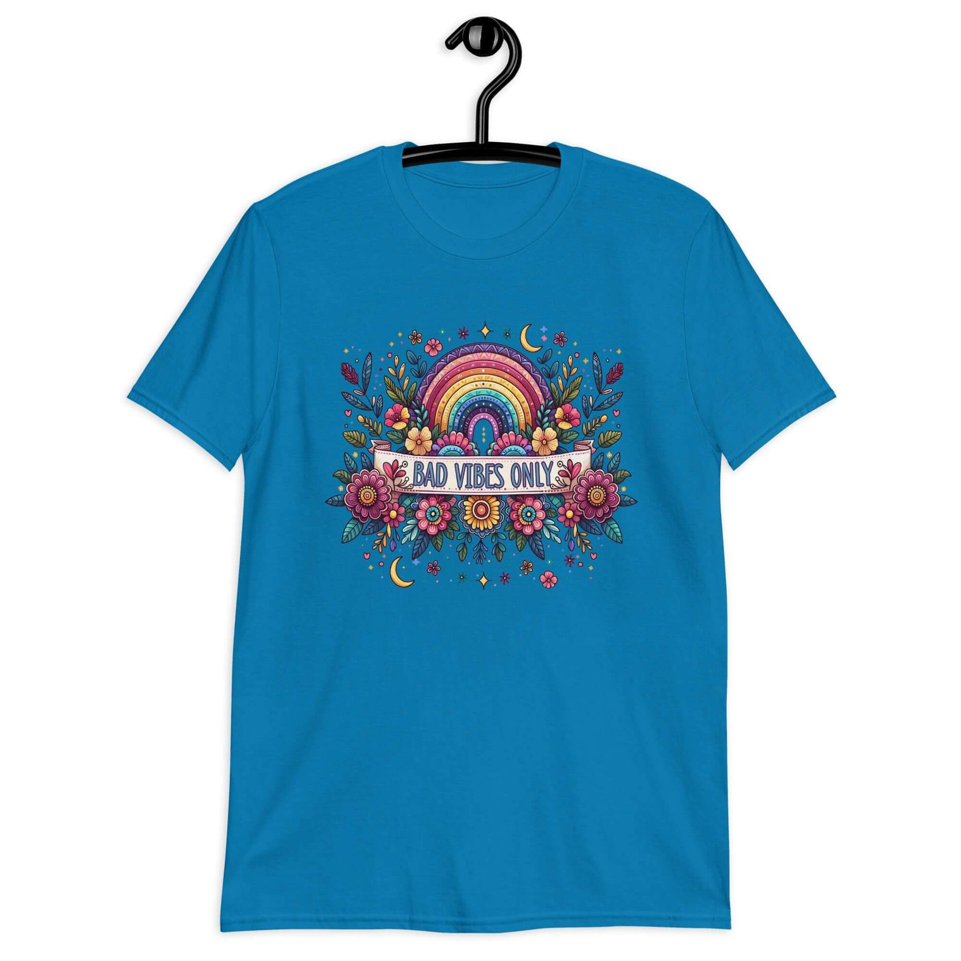 Sapphire blue t-shirt with a colorful boho rainbow floral design and the phrase Bad Vibes Only printed on the front.