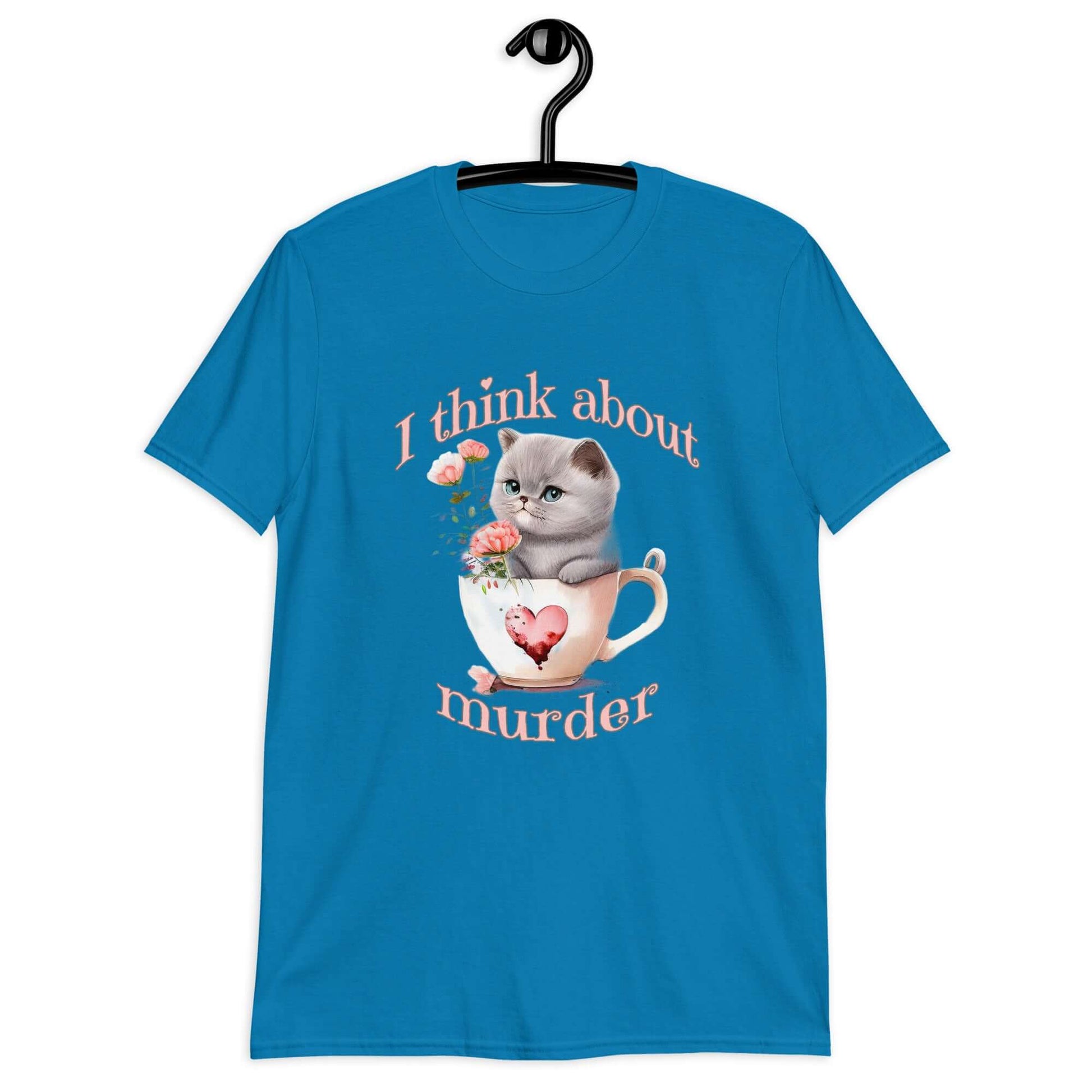 Sapphire blue t-shirt that says I think about murder with image of cute fluffy kitten sitting in a teacup printed on the front.