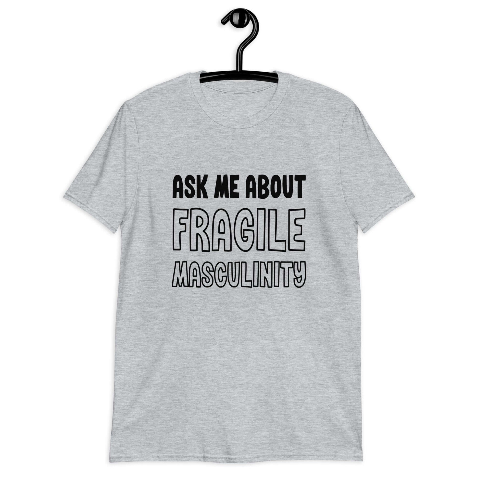 Light sport grey t-shirt with the phrase Ask me about fragile masculinity printed on the front.