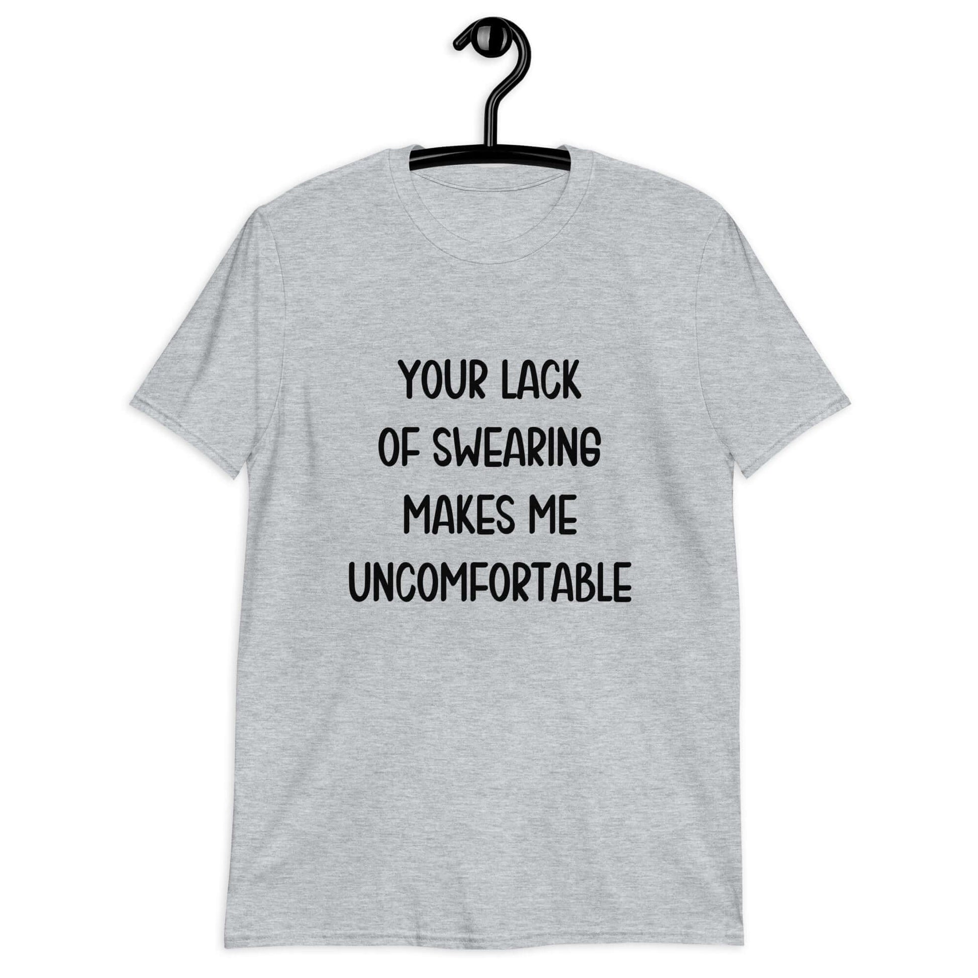 Sport grey t-shirt with the phrase Your lack of swearing makes me uncomfortable printed on the front.