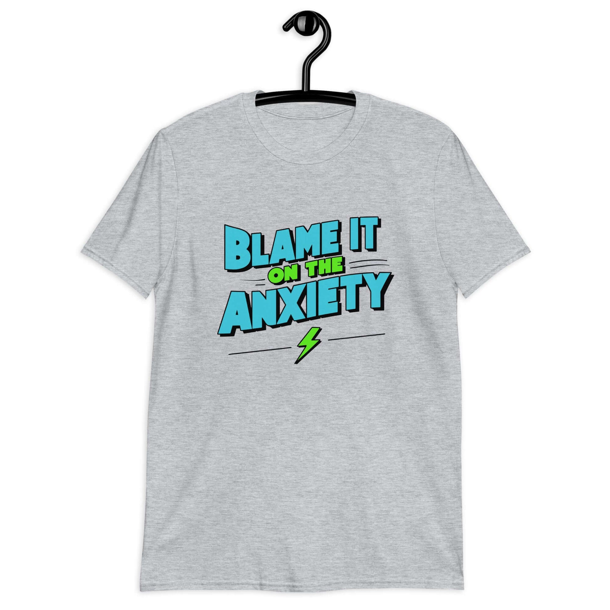 Sport grey t-shirt with the phrase Blame is on the anxiety printed on the front. The graphics are bold and in aqua and lime green.