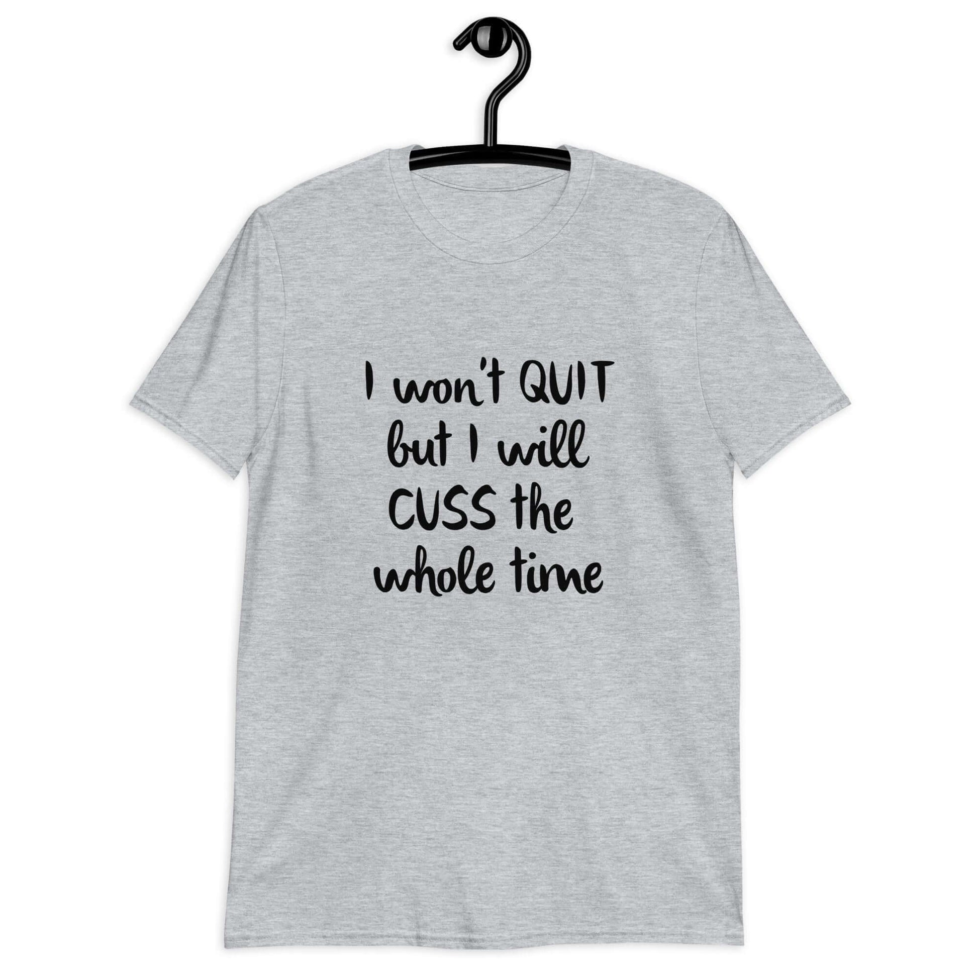 Sport grey t-shirt with the phrase I won't quit but I will cuss the whole time printed on the front.