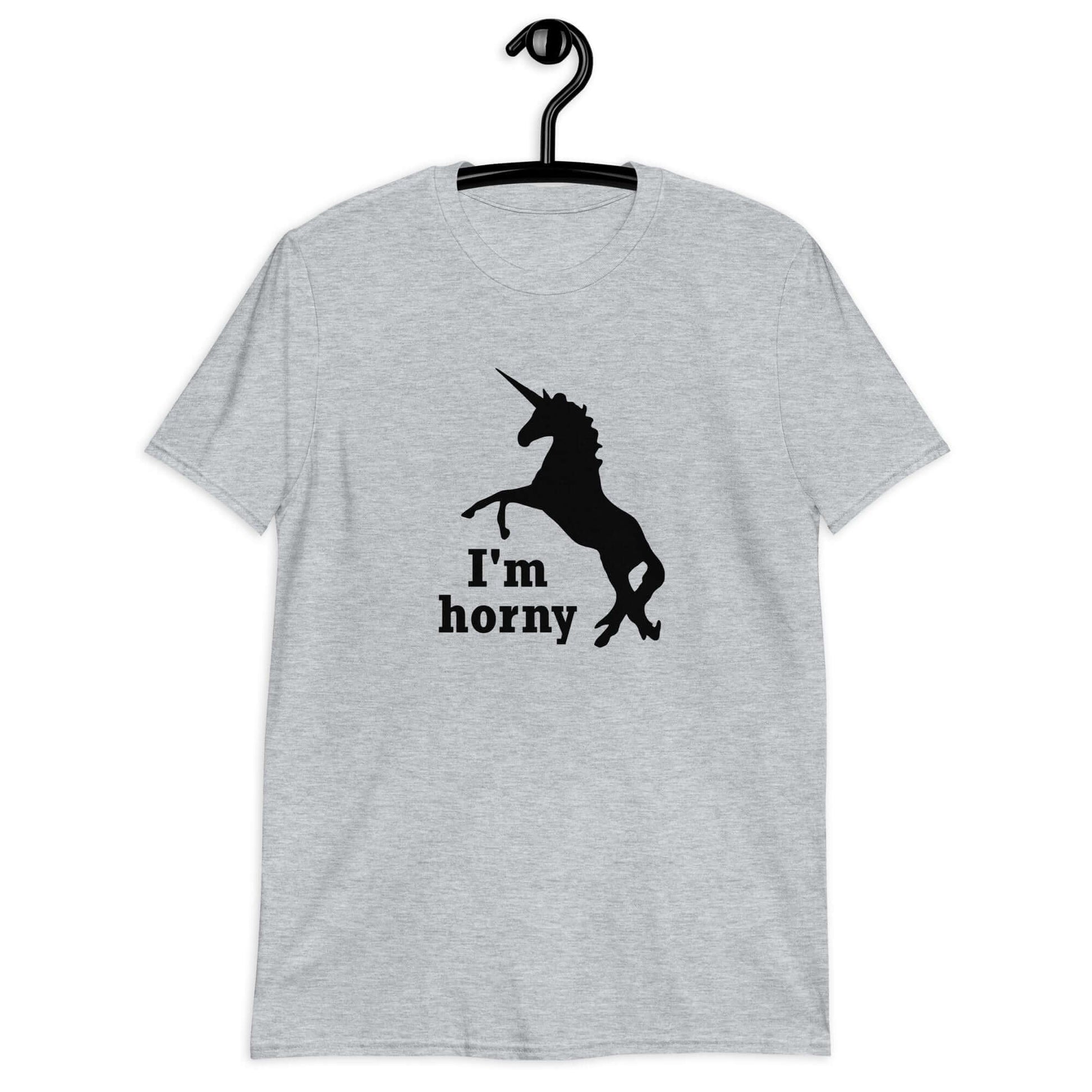 Sport grey t-shirt with an image of the silhouette of a unicorn and the words I'm horny printed on the front.