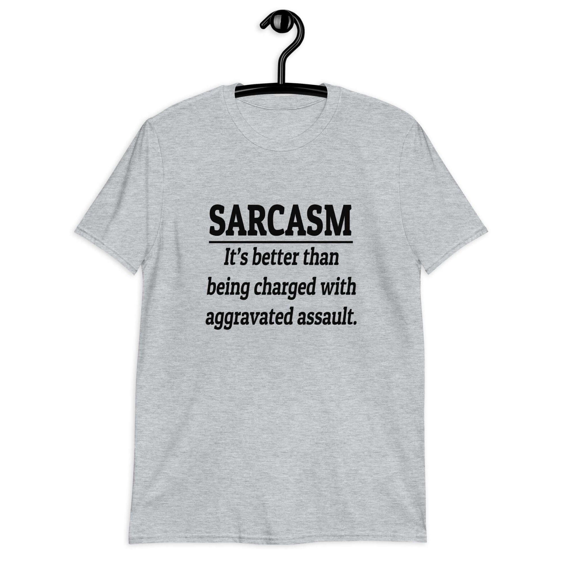 Sport grey t-shirt with the phrase Sarcasm, it's better than being charged with aggravated assault printed on the front of the shirt.