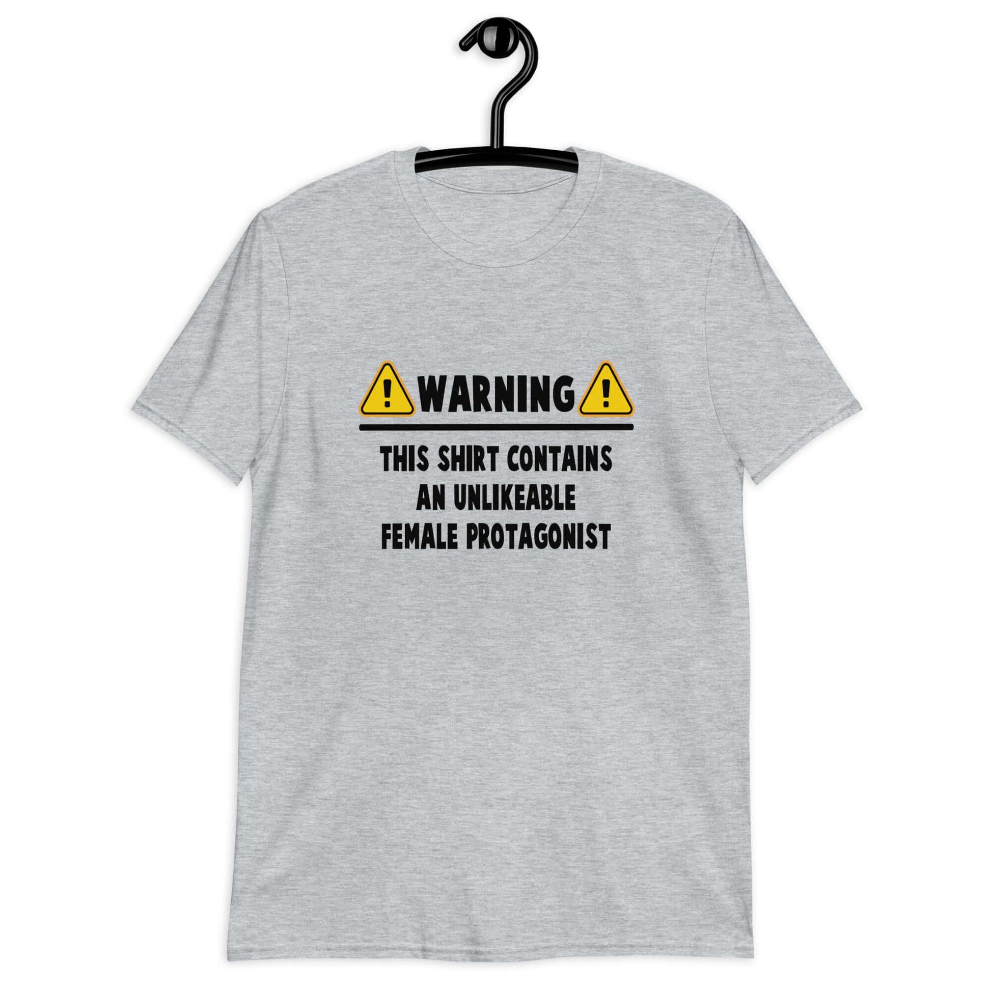 Sport grey t-shirt with the phrase Warning this shirt contains an unlikable female protagonist printed on the front.