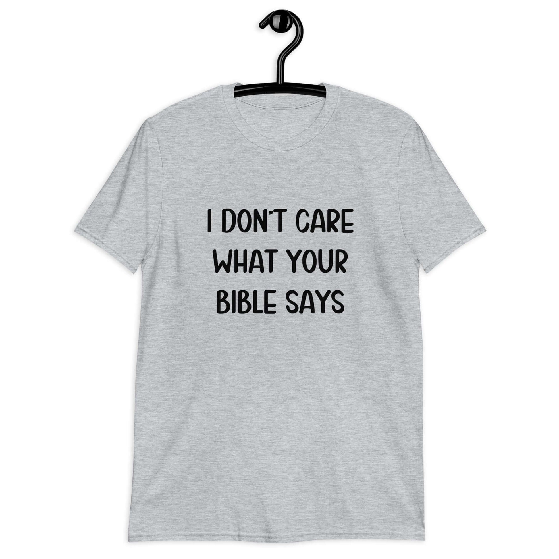 Sport grey t-shirt with the phrase I don't care what your bible says printed on the front.