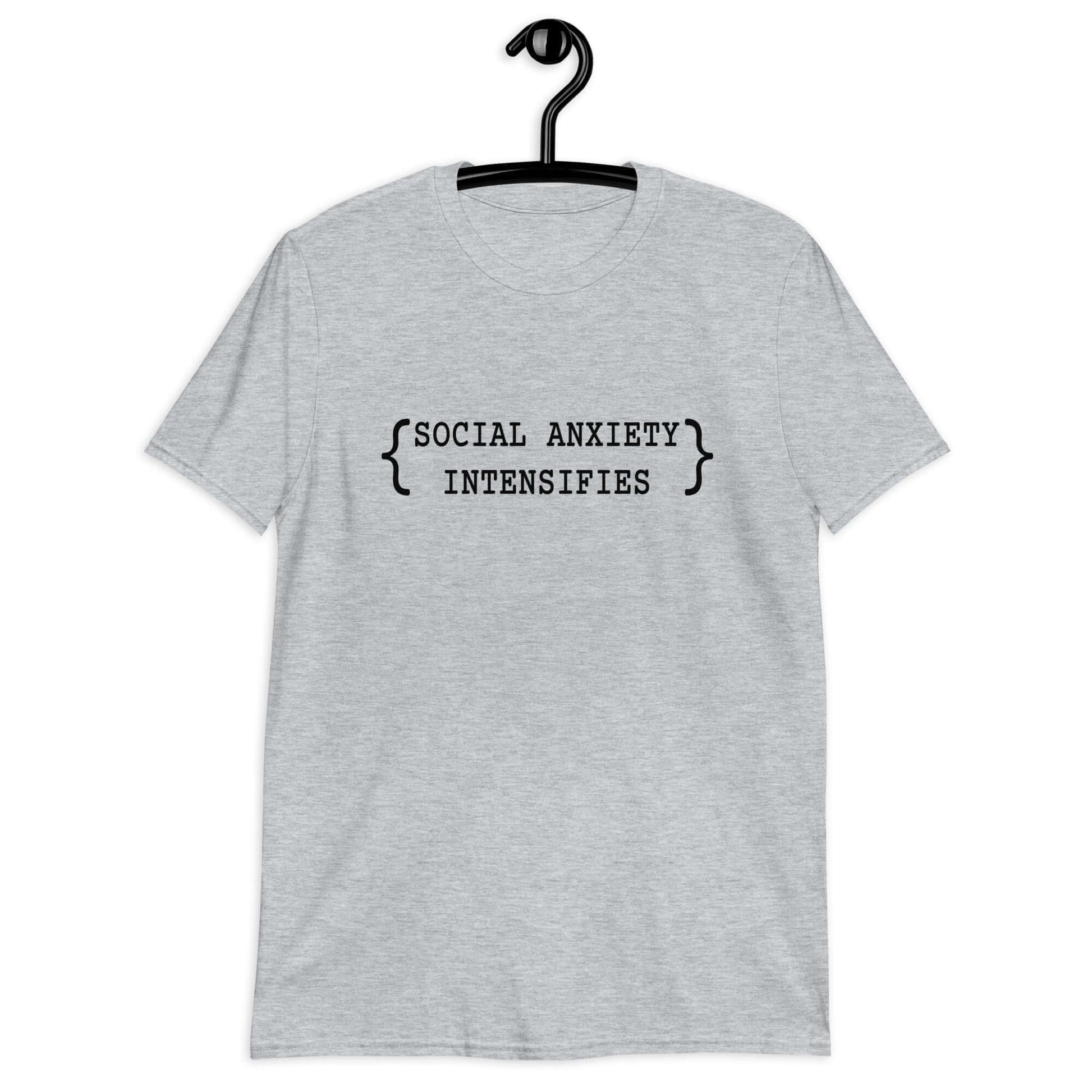 Sport grey t-shirt with the words Social anxiety intensifies printed on the front.