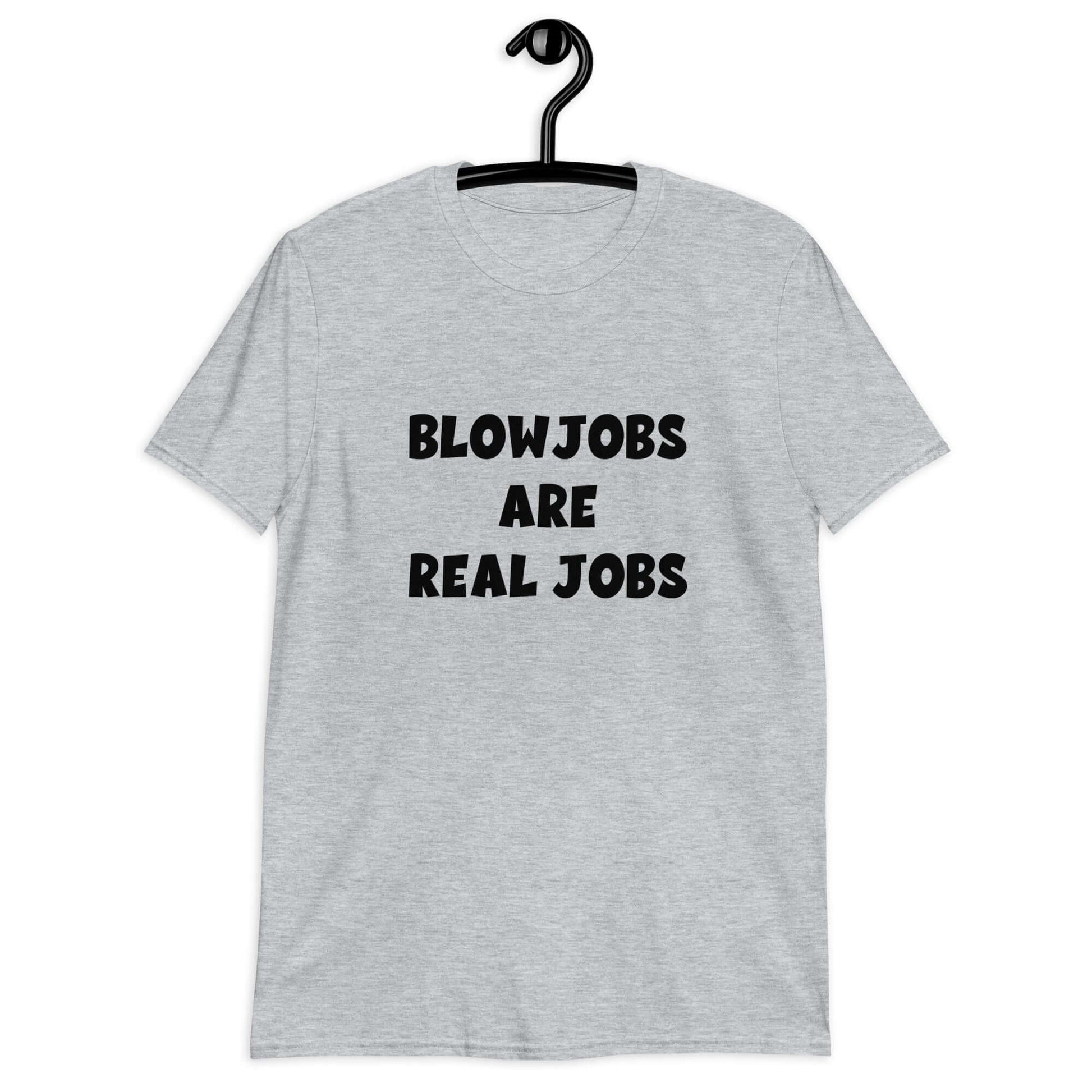 Sport grey t-shirt with the phrase Blowjobs are real jobs printed on the front.