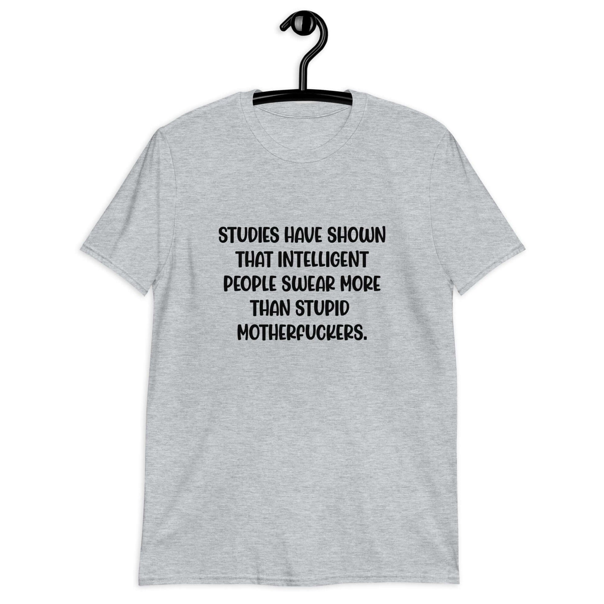 Sport grey t-shirt with the funny phrase Studies have shown that intelligent people swear more than stupid motherfuckers printed on the front.