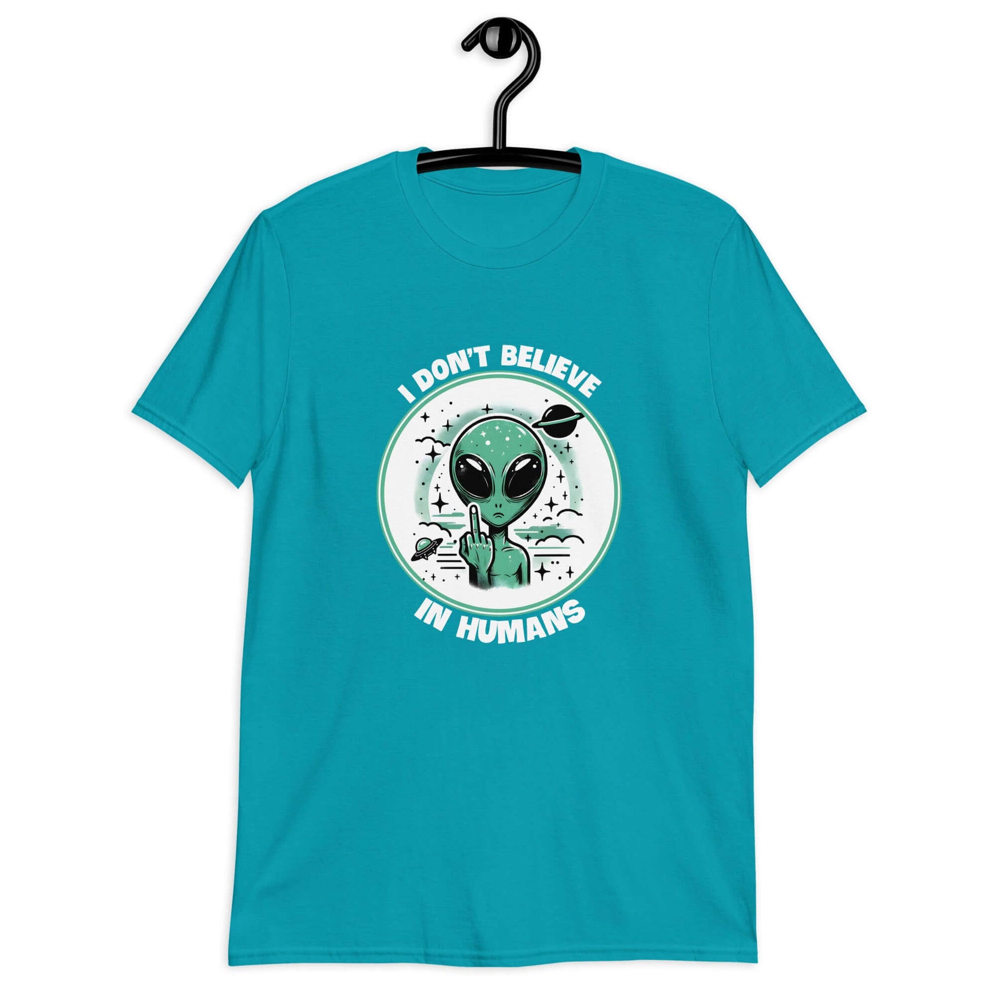 Tropical blue t-shirt with an image of an alien flipping the middle finger. The words I don't believe in humans are printed around the image. The graphics are printed on the front of the shirt.