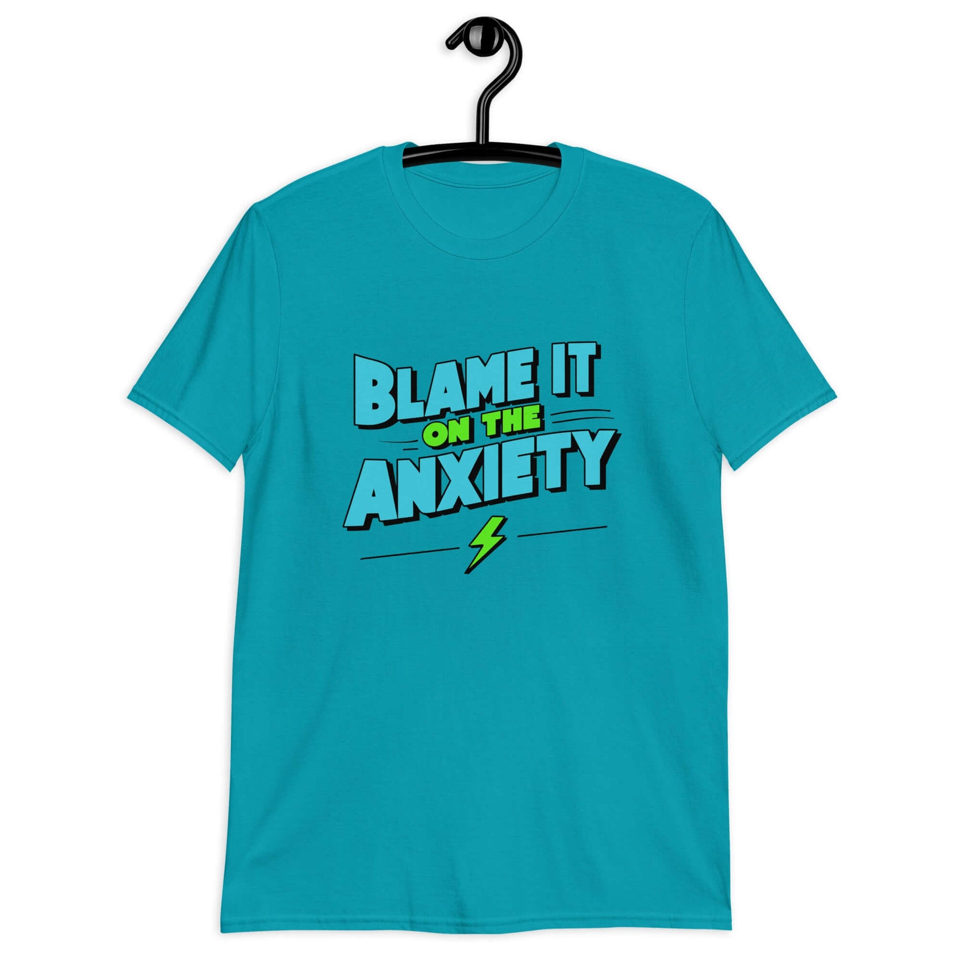 Tropical blue t-shirt with the phrase Blame is on the anxiety printed on the front. The graphics are bold and in aqua and lime green.